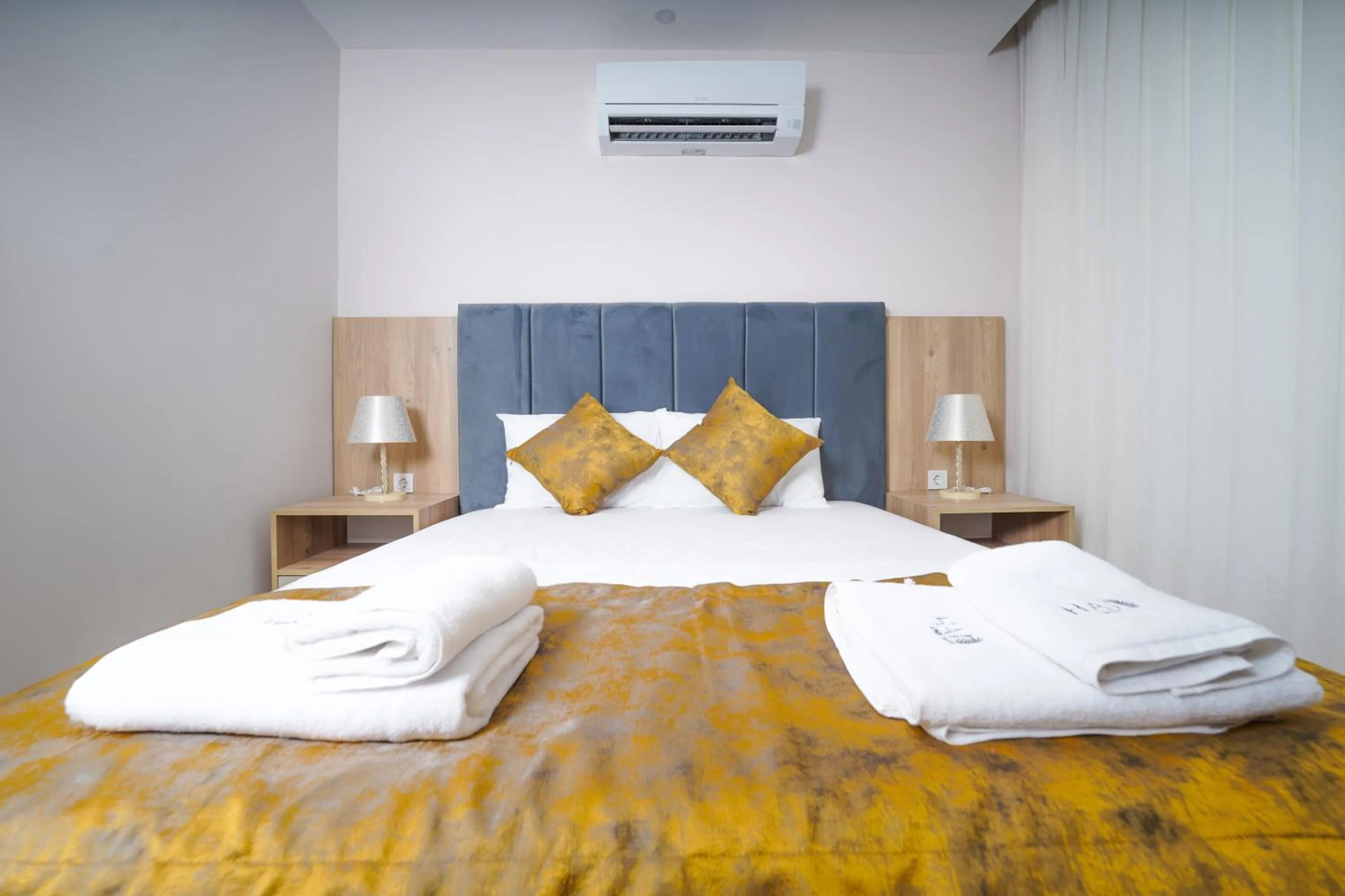 Bed in Han Apart Hotel Side