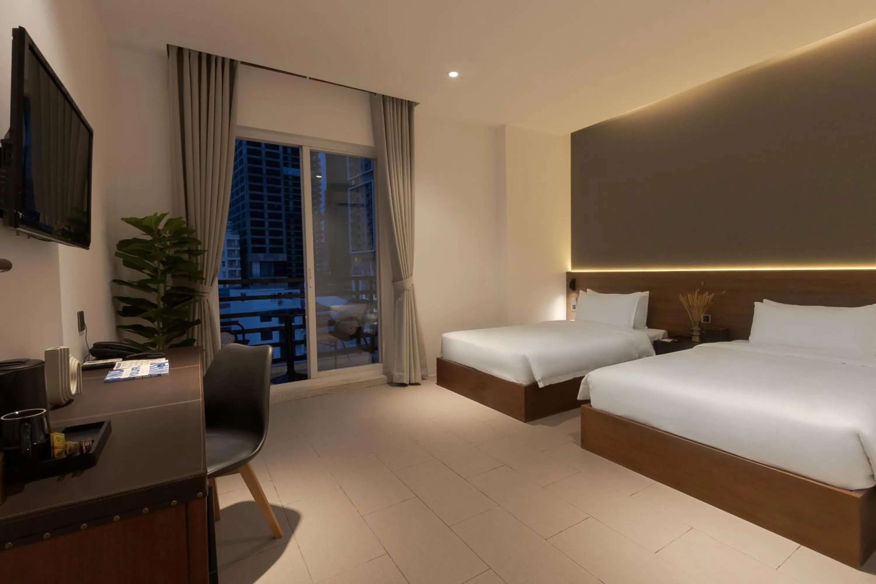 Communal lounge/ TV room, Bed in WH Hotel 310