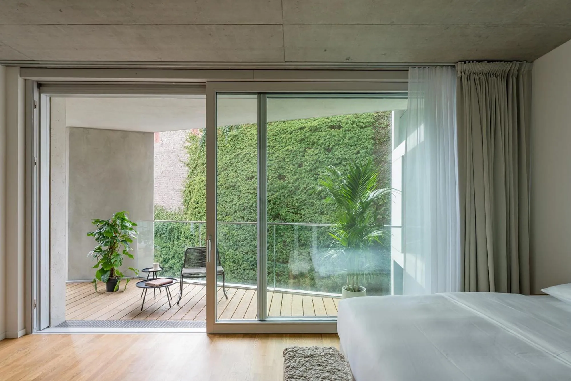 Balcony/Terrace, Bed in Wilmina Apartments & Lofts