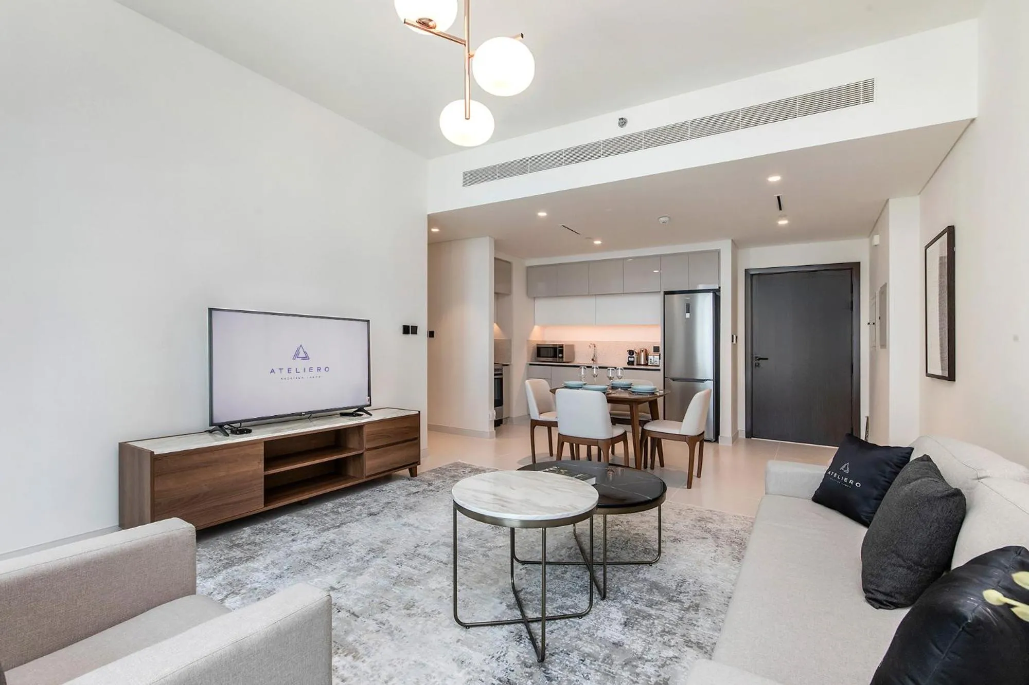 TV and multimedia in Chic Apartments in Marina Vista Emaar Beachfront
