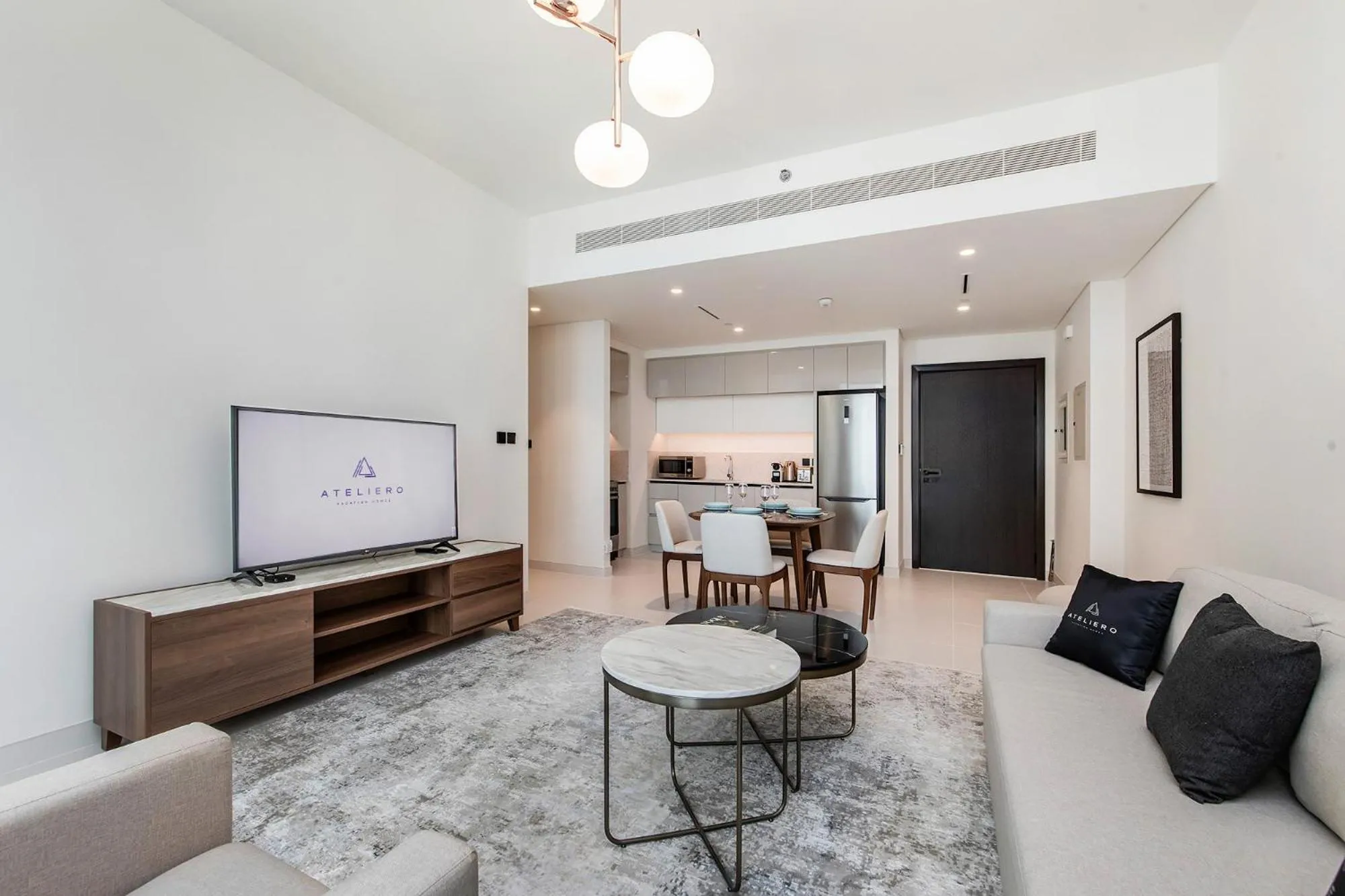 TV and multimedia in Chic Apartments in Marina Vista Emaar Beachfront