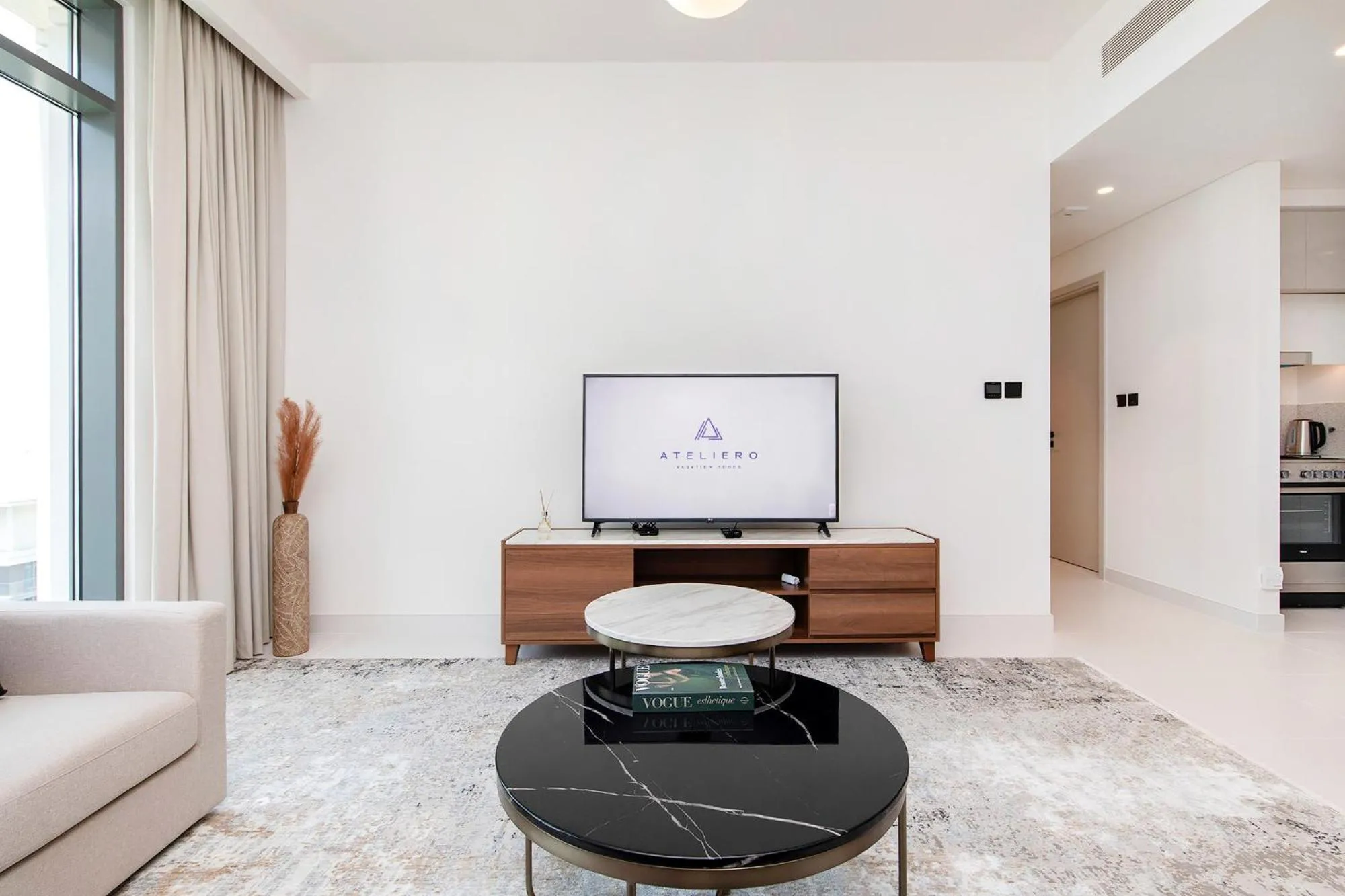 TV and multimedia in Chic Apartments in Marina Vista Emaar Beachfront
