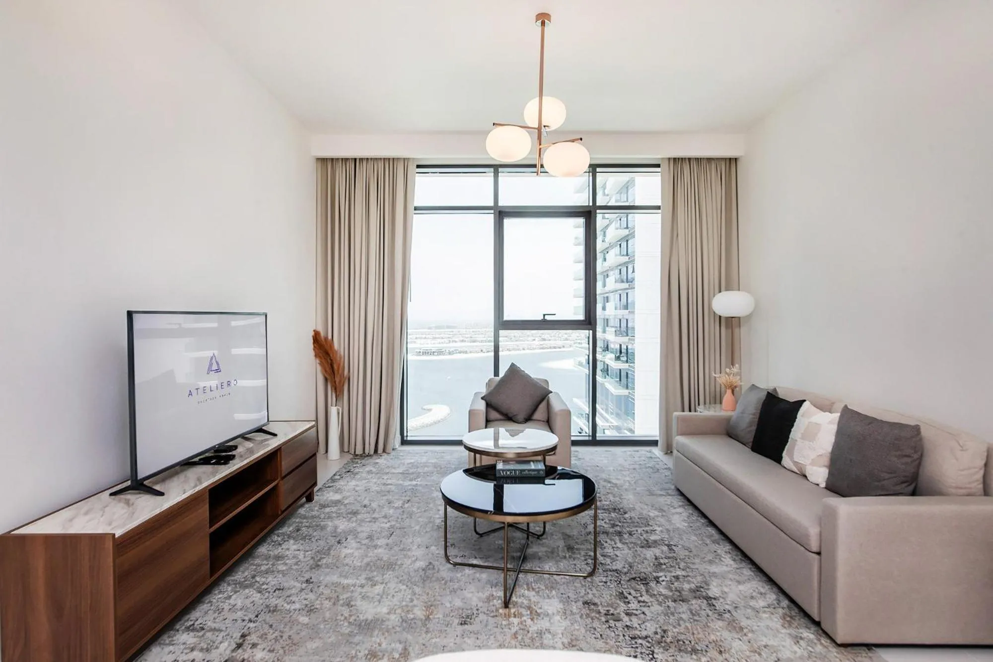 TV and multimedia in Chic Apartments in Marina Vista Emaar Beachfront