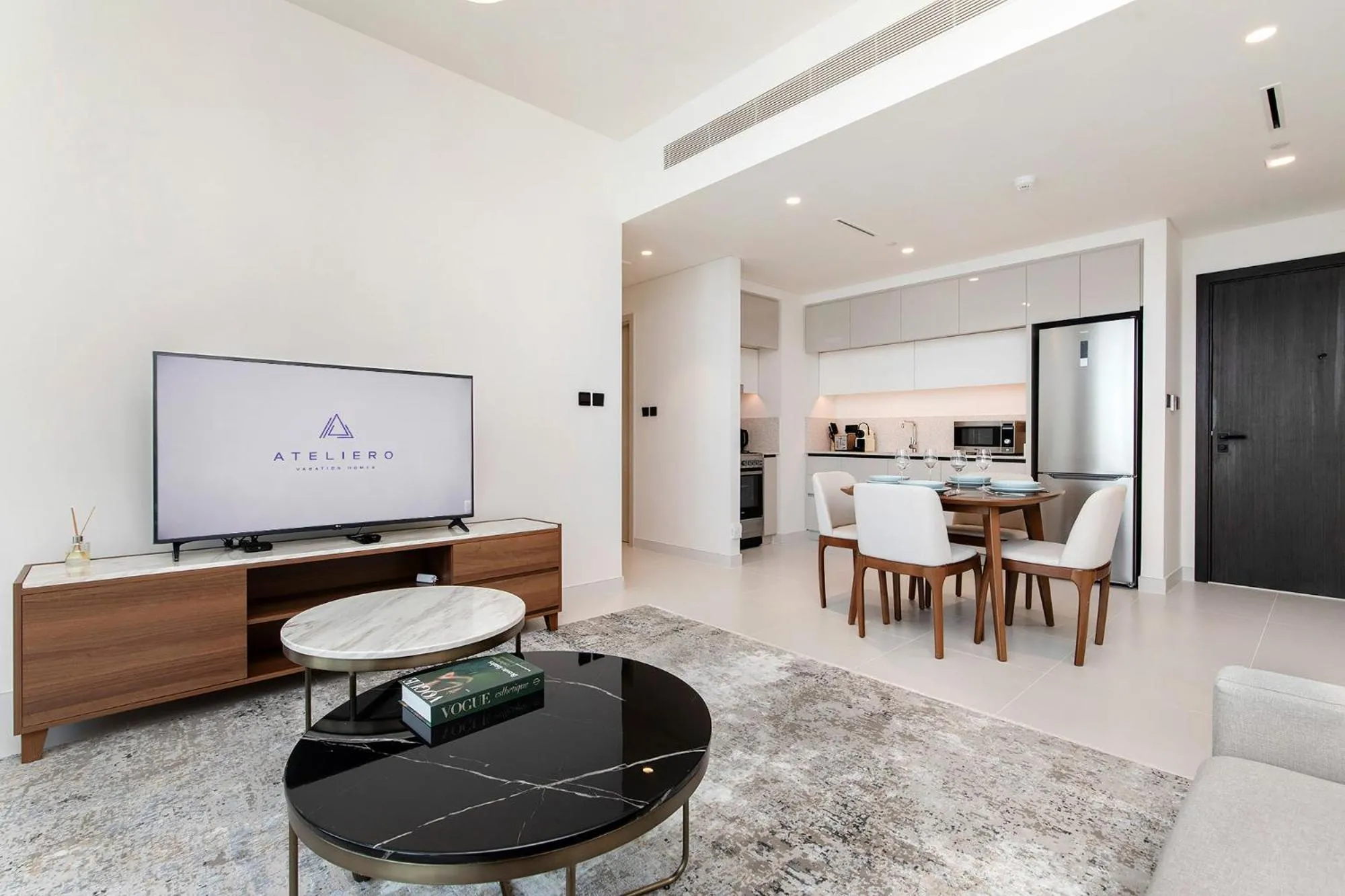 TV and multimedia in Chic Apartments in Marina Vista Emaar Beachfront
