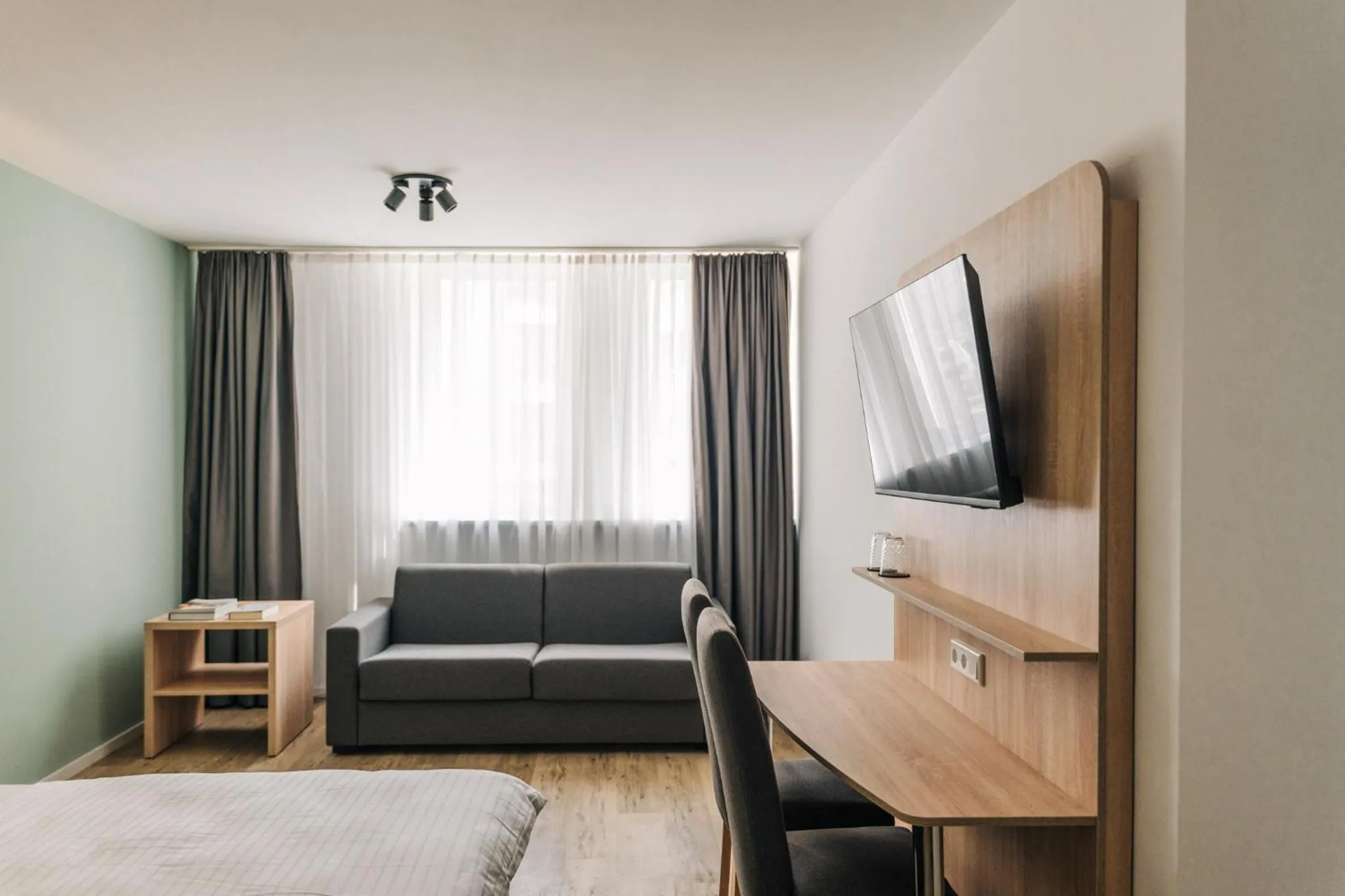 Bed in Homaris Corner Hotel