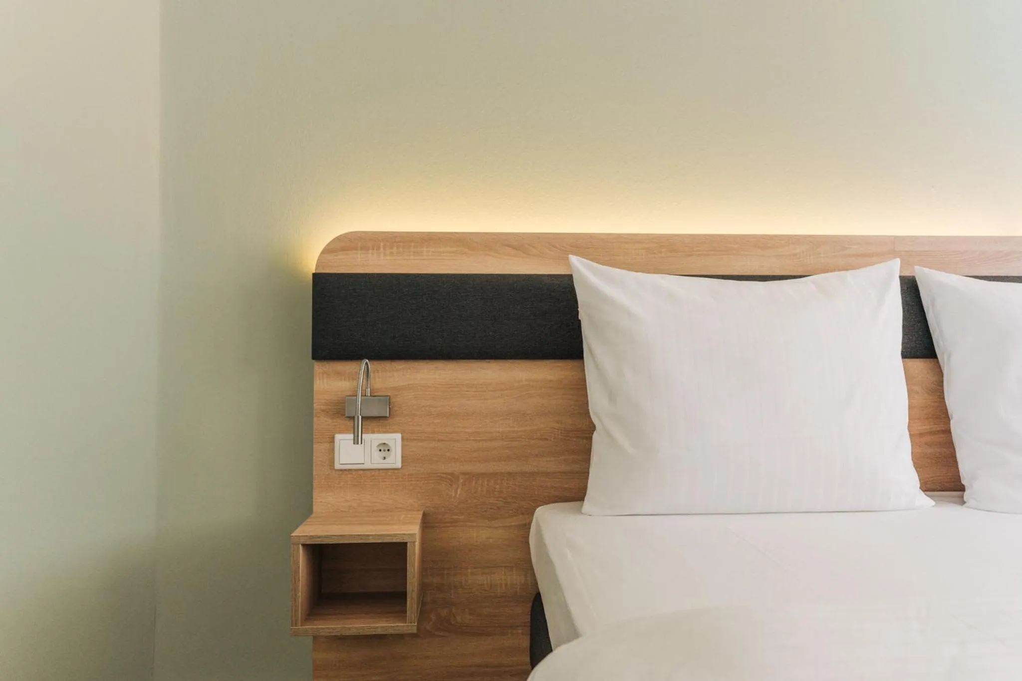 Bed in Homaris Corner Hotel