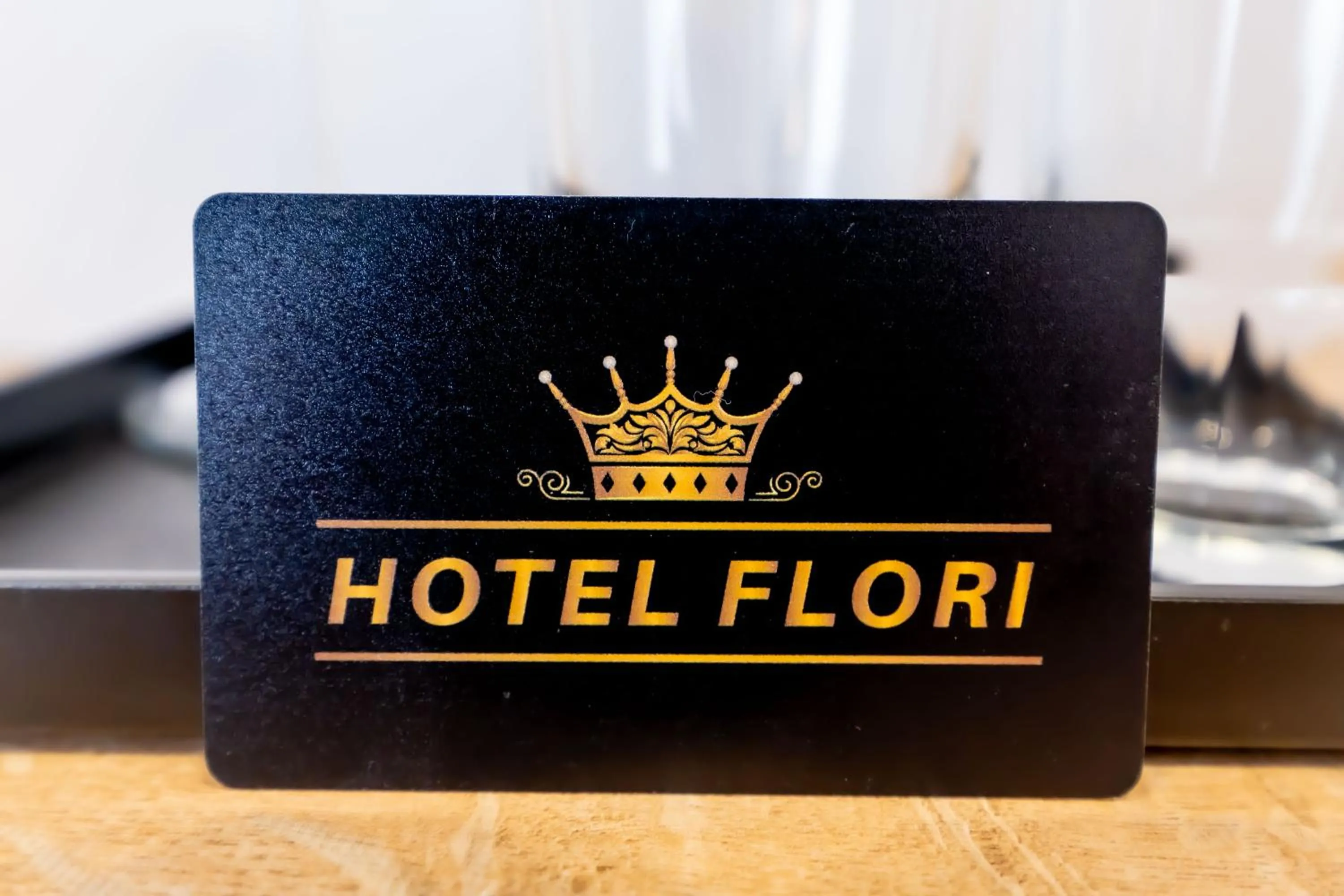 Property logo or sign in Hotel Flori