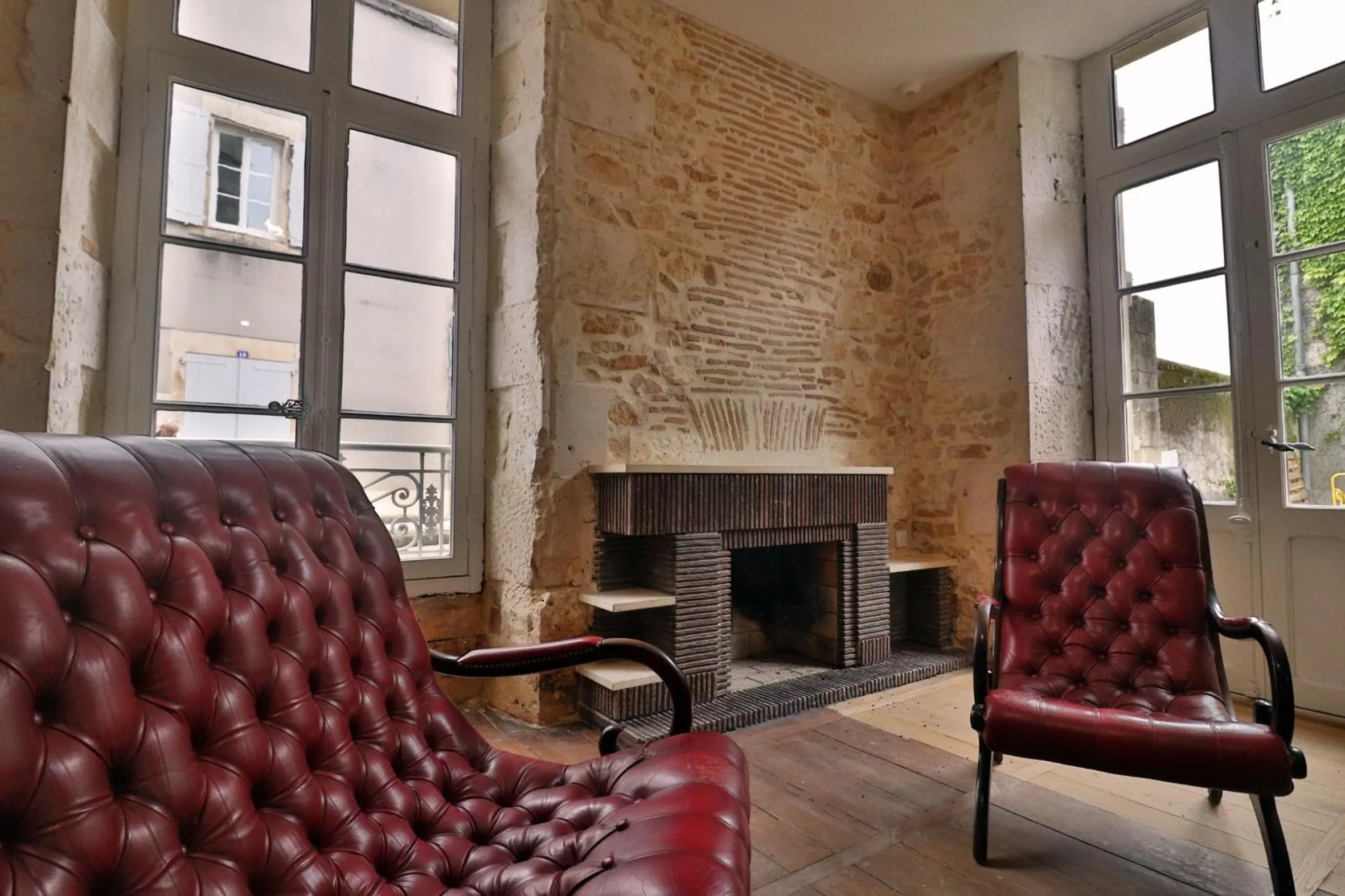 Communal lounge/ TV room in Le25 Parahotellerie