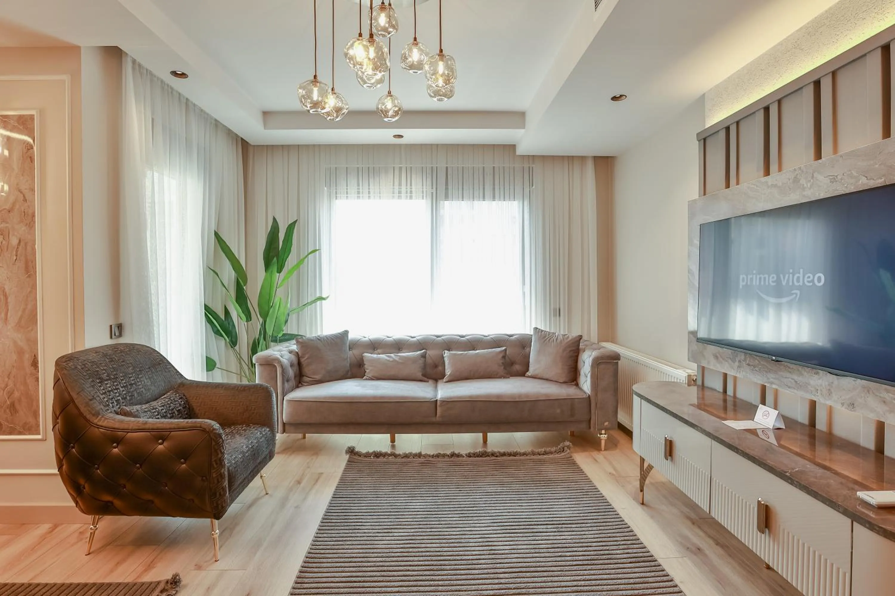 Communal lounge/ TV room in Los Suites