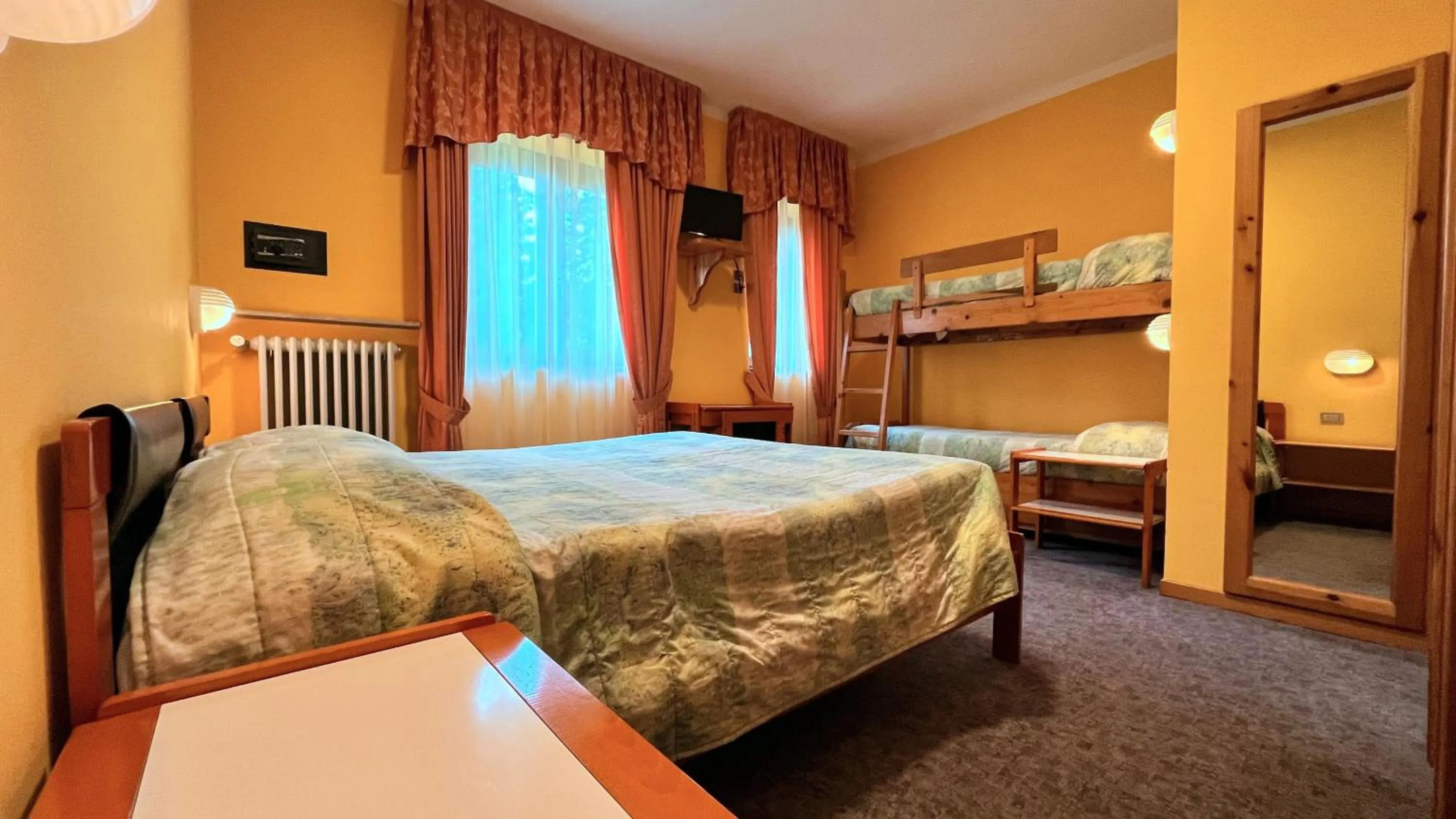 Bed in Hotel Le Pinete