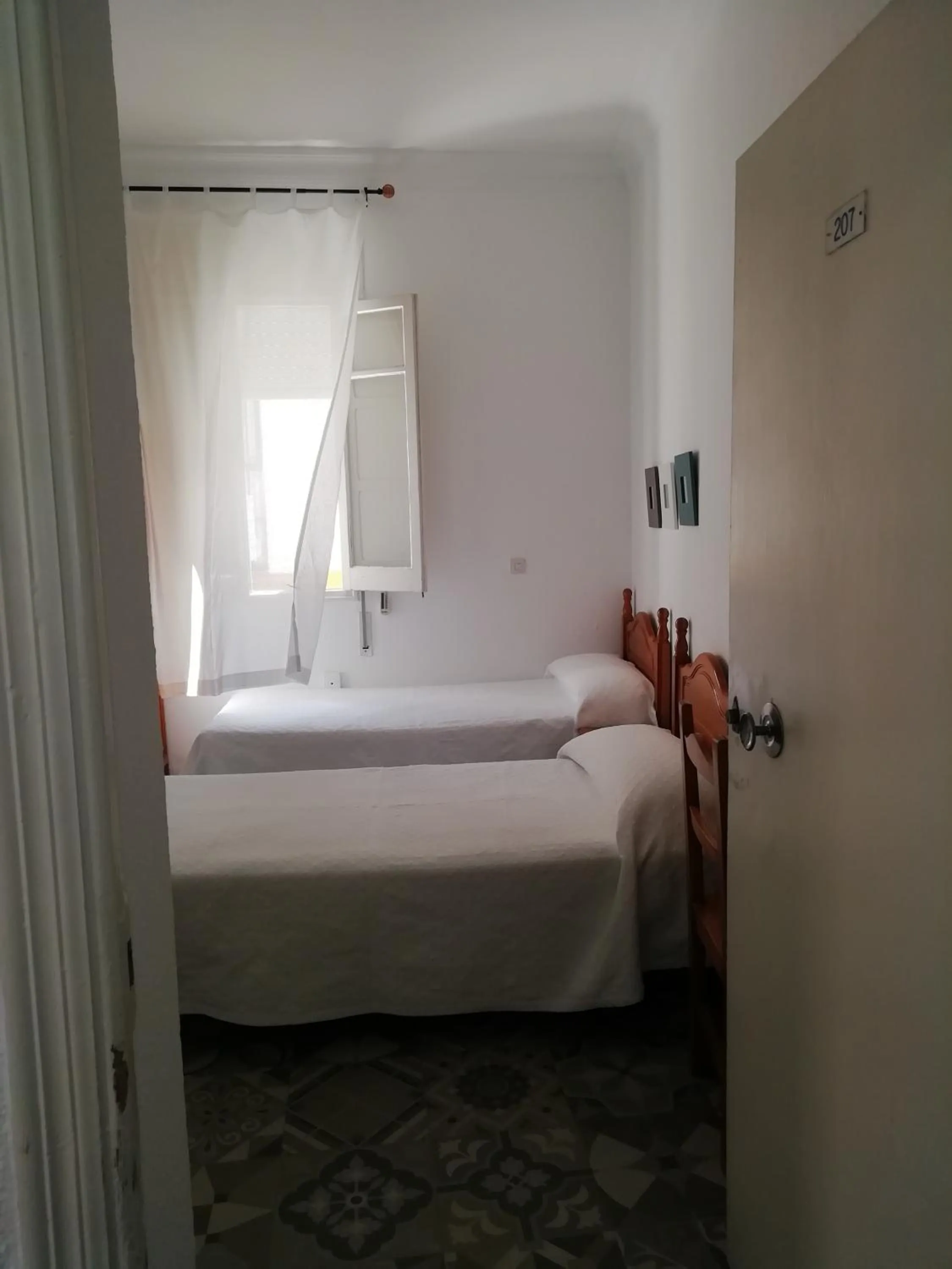 Bed in Hostal Sierpes