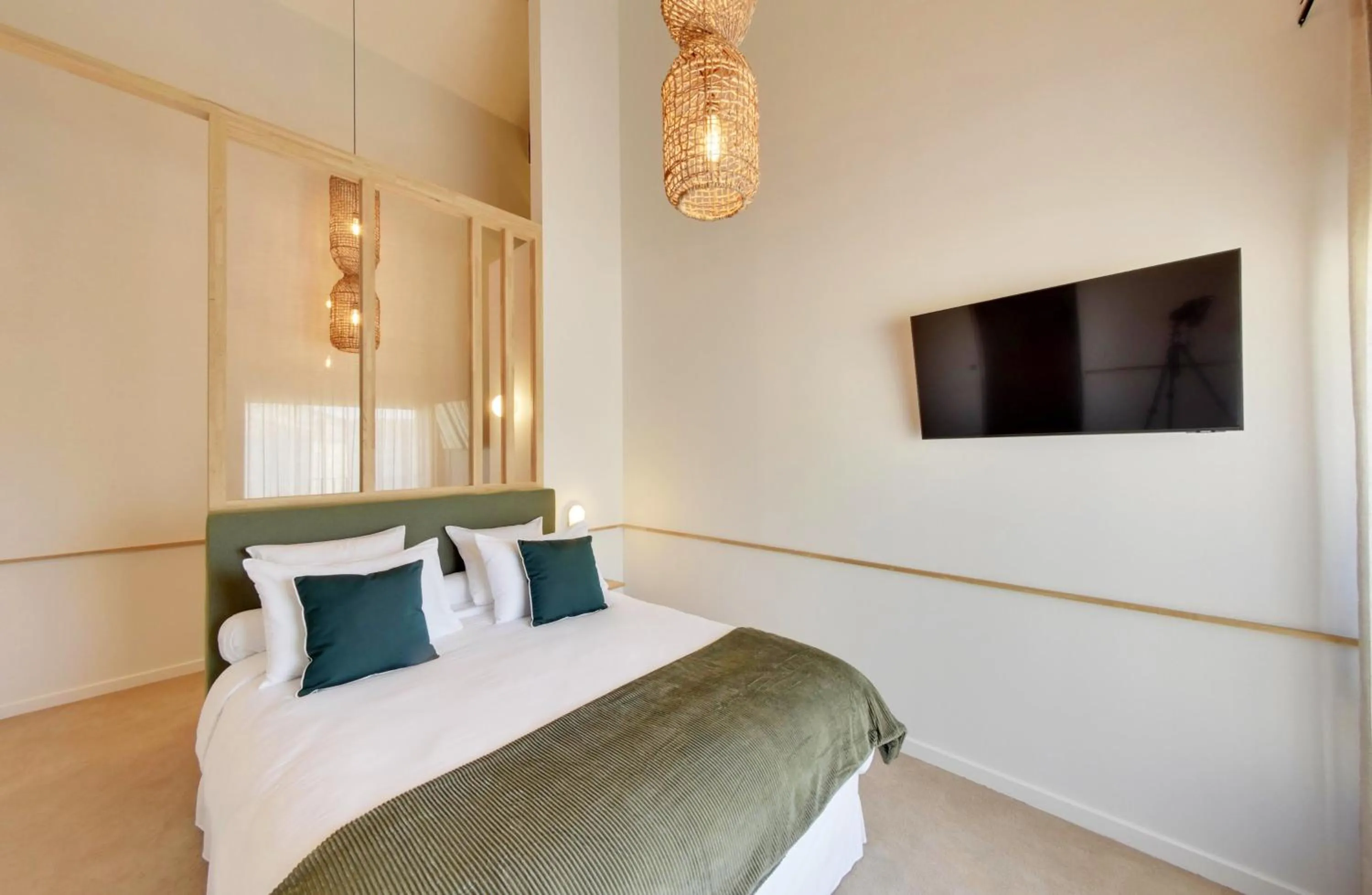 Bed in La Maison Gaïa Hôtel & Spa