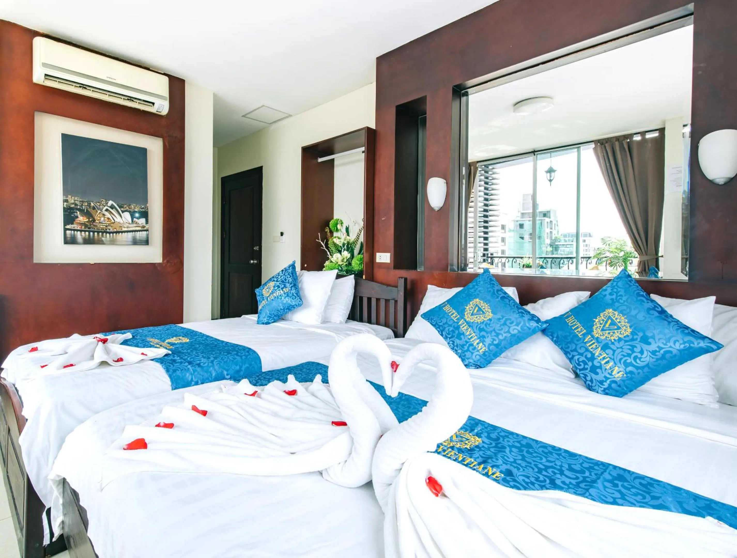 Photo of the whole room, Bed in V Hotel Vientiane