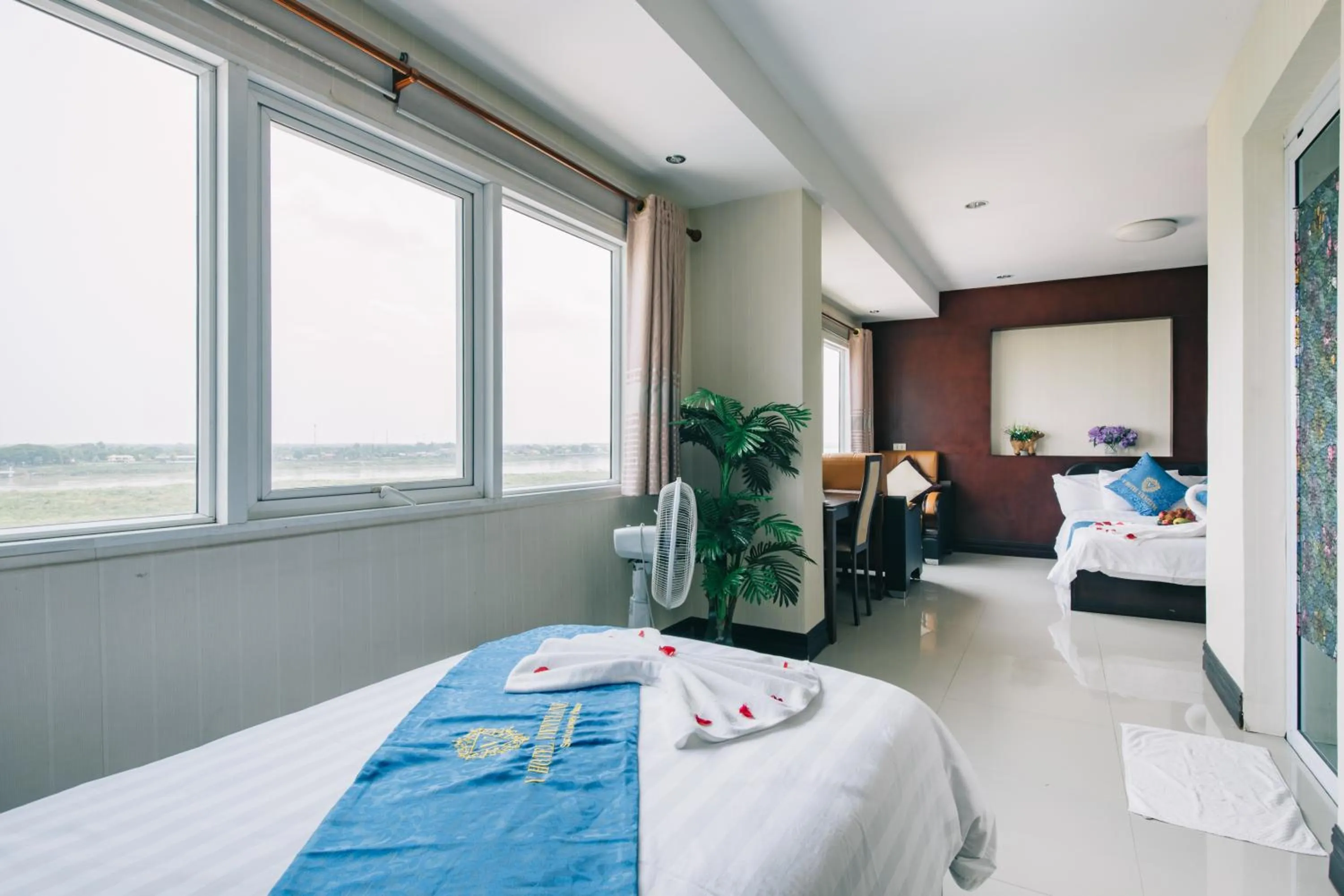 Photo of the whole room, Bed in V Hotel Vientiane