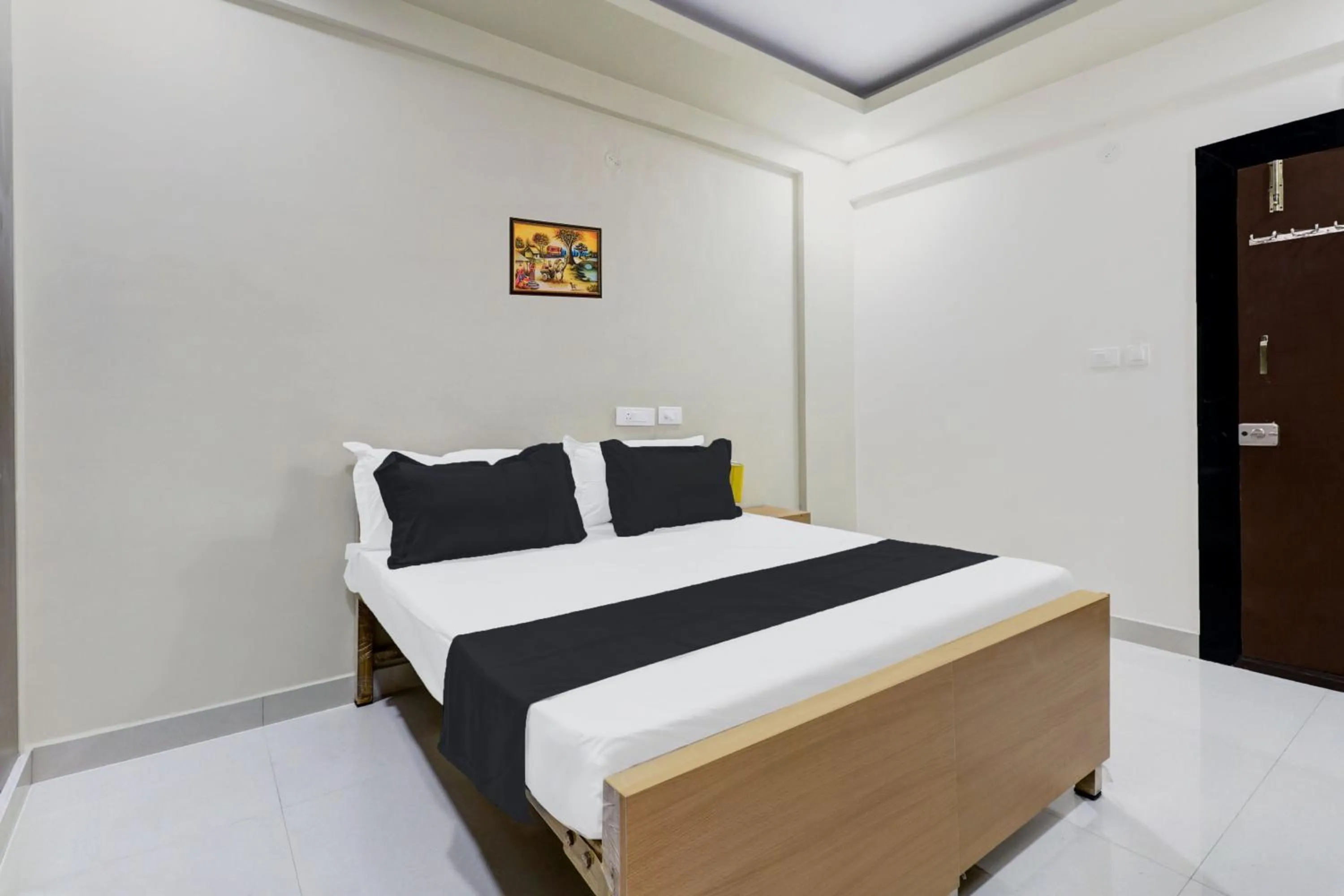Bedroom in Hotel O Sri Harshitha Grand Near Zudio - Star Bazaar, Kundalhalli Gate