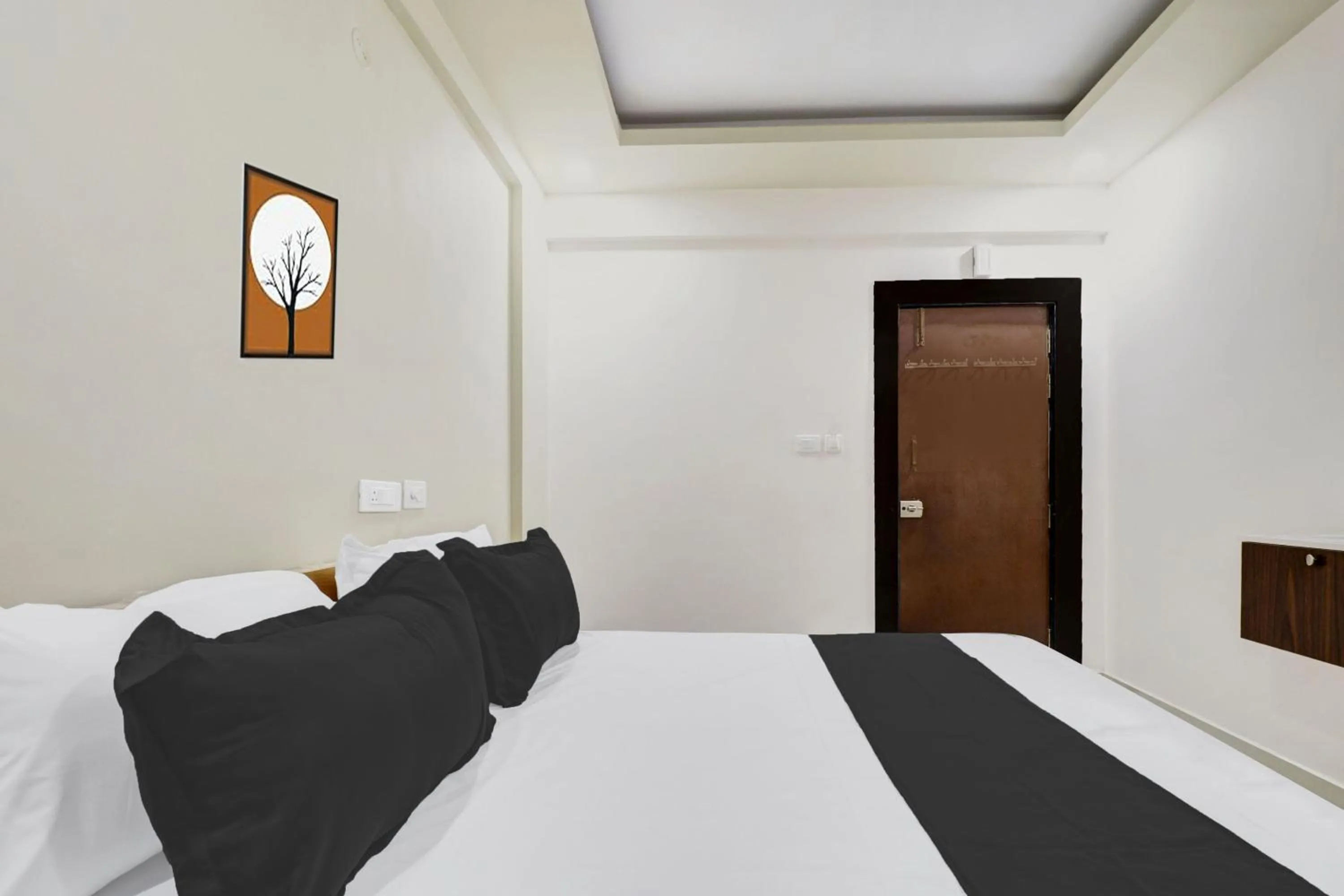 Bedroom in Hotel O Sri Harshitha Grand Near Zudio - Star Bazaar, Kundalhalli Gate