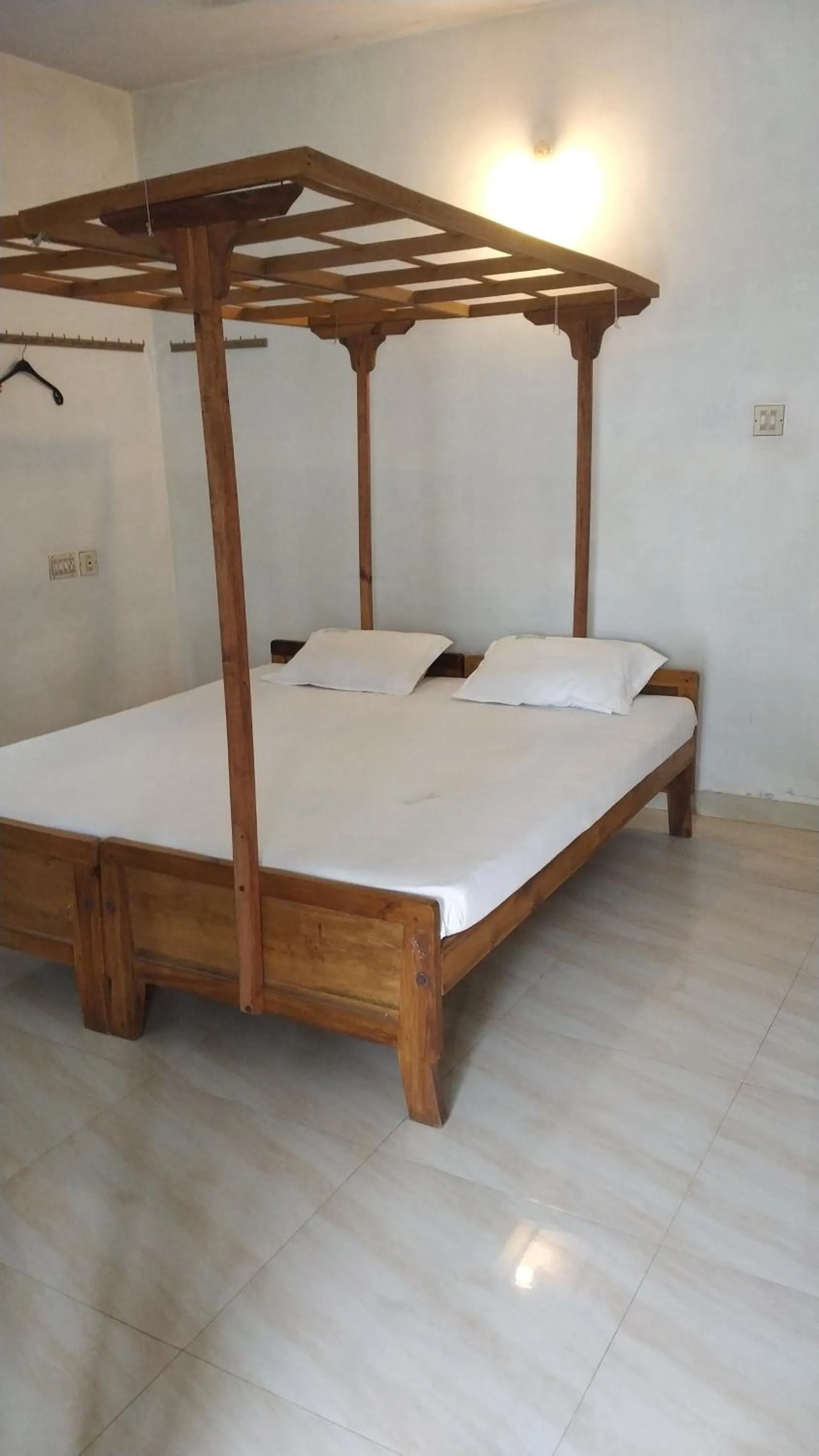 Bed in Deauvill Home Stay
