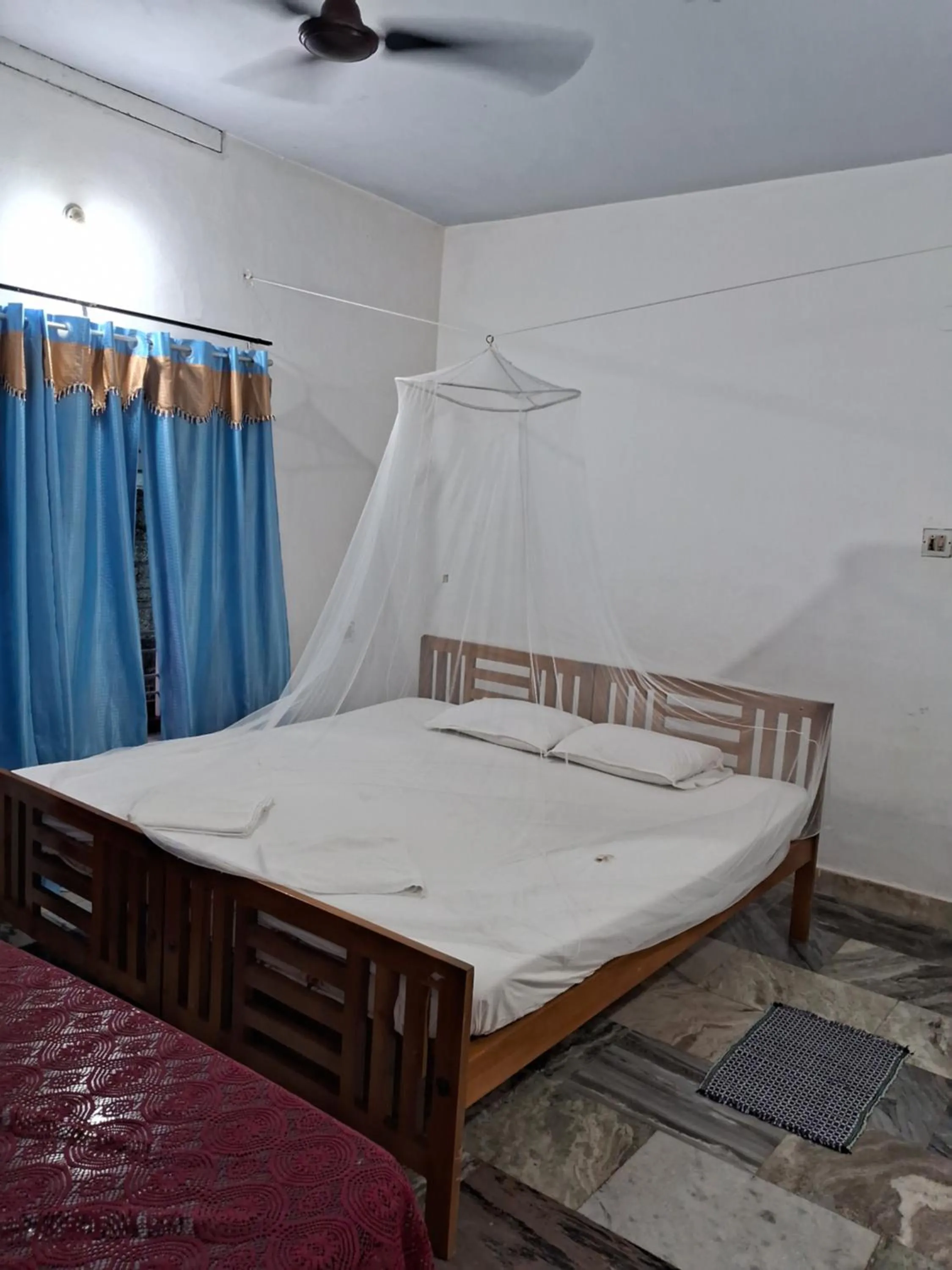 Bed in Deauvill Home Stay