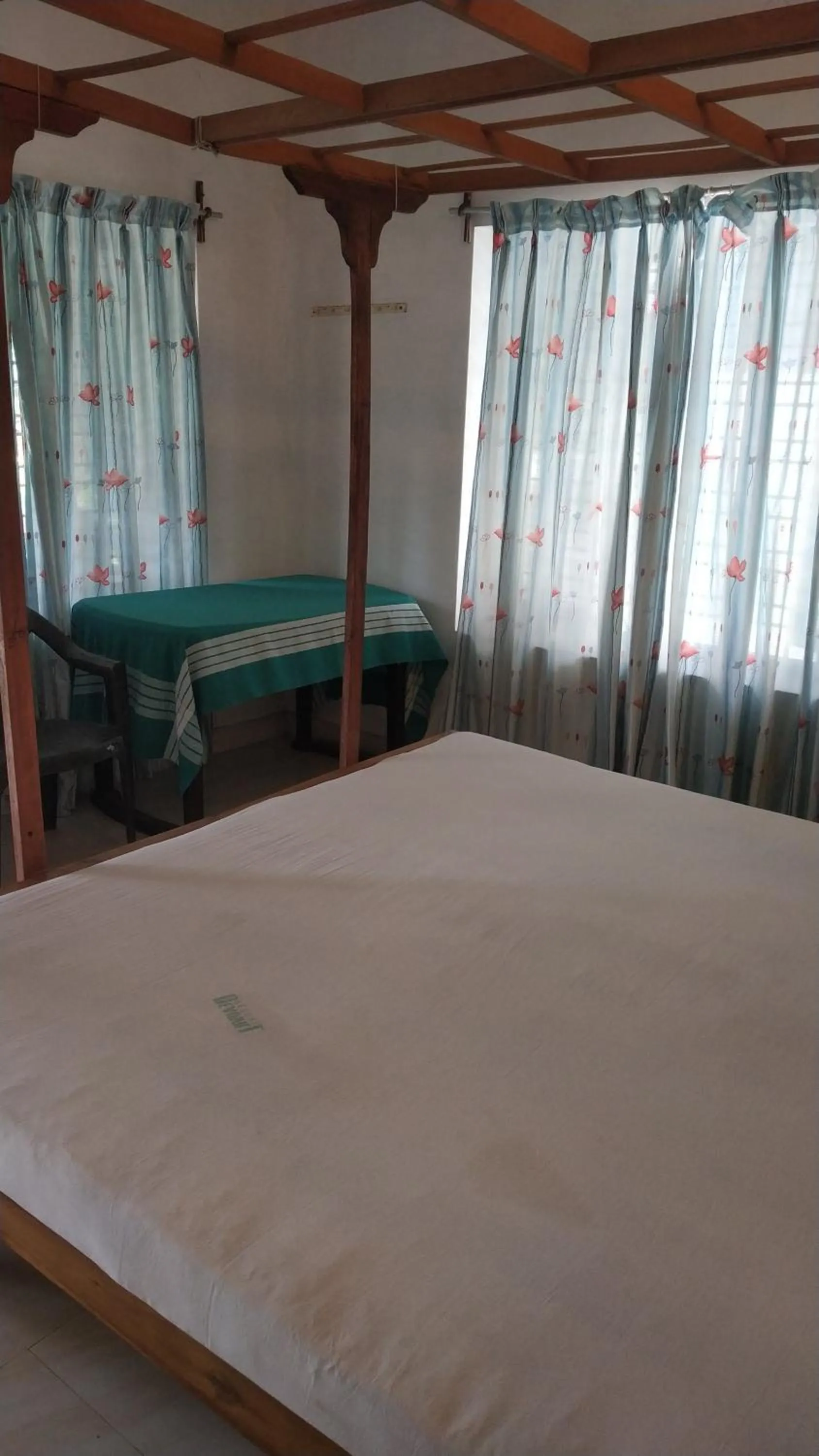 Bed in Deauvill Home Stay