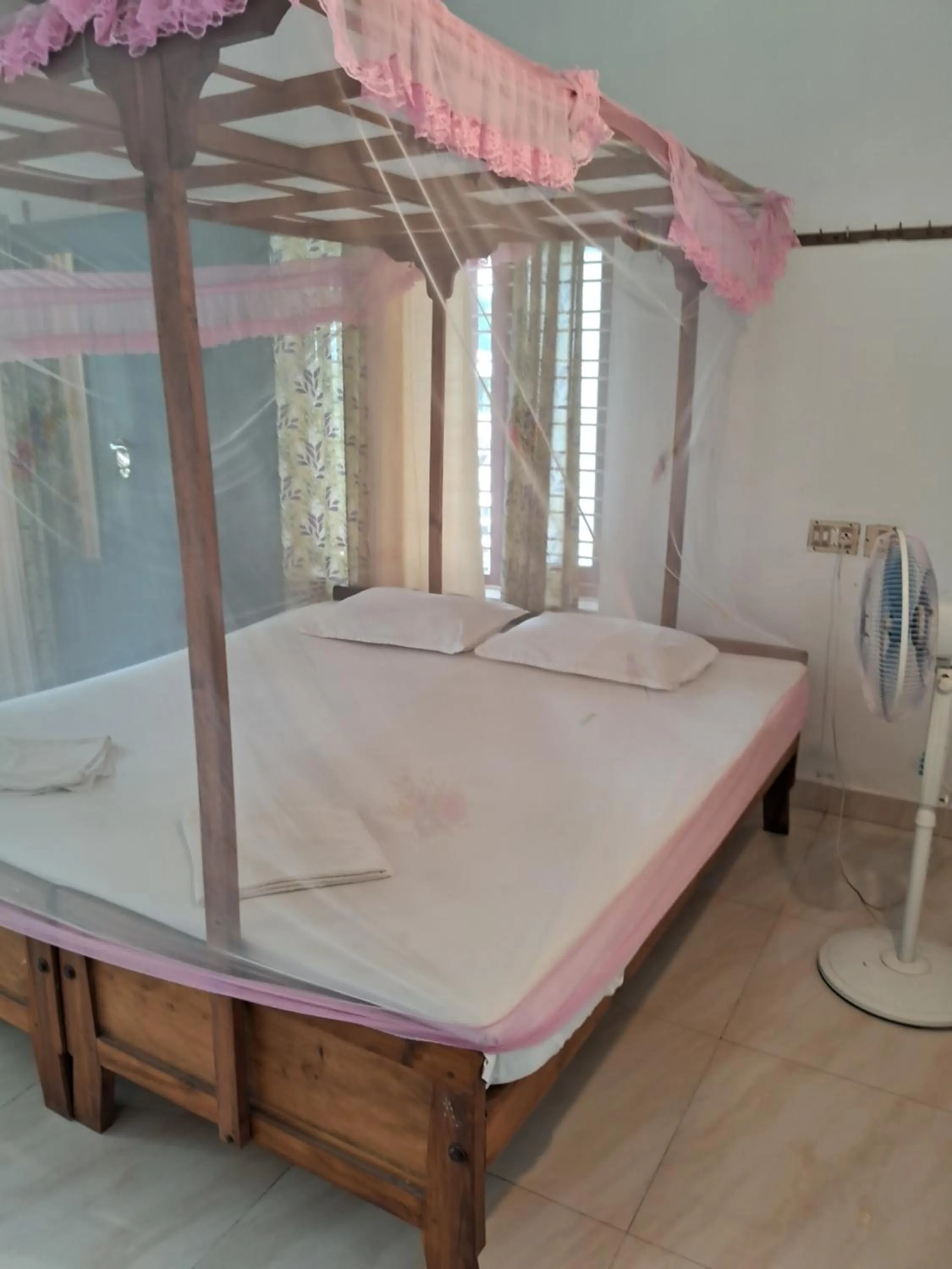 Bed in Deauvill Home Stay