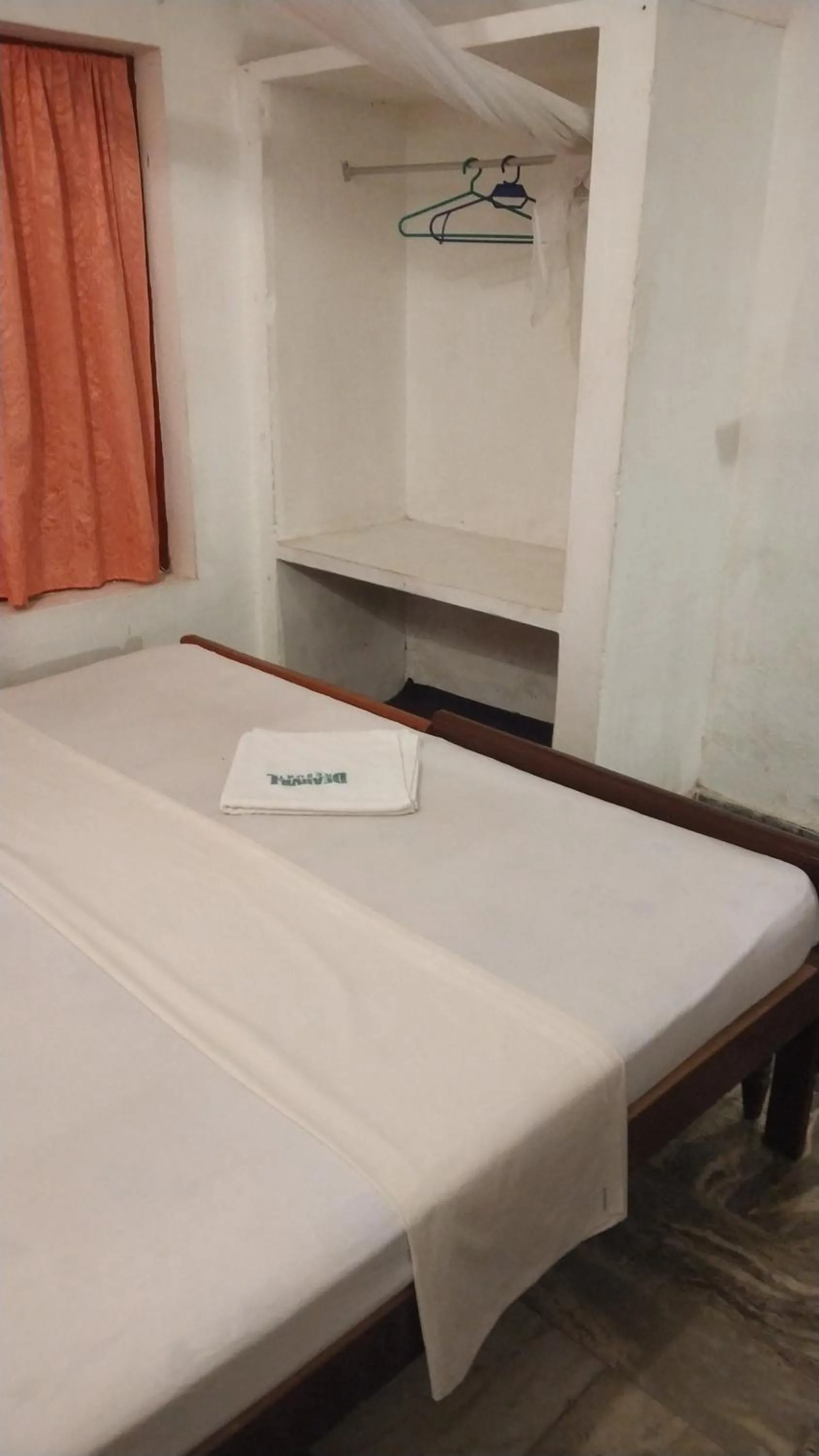 Bed in Deauvill Home Stay