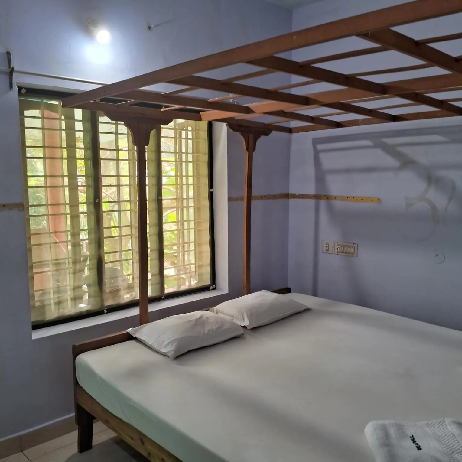 Bed in Deauvill Home Stay