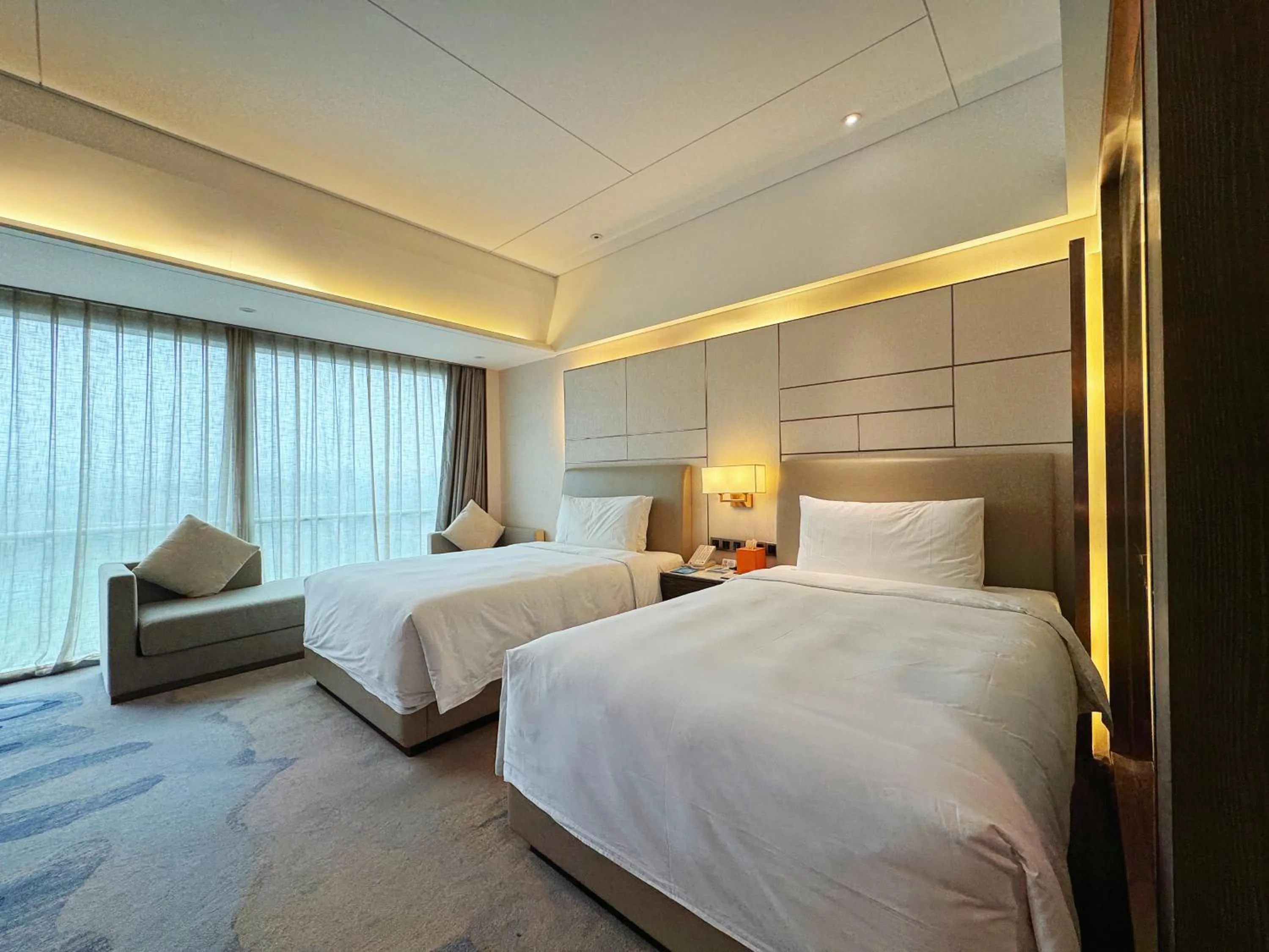 Bed in Beijing Xiamenair Jianianhua Hotel