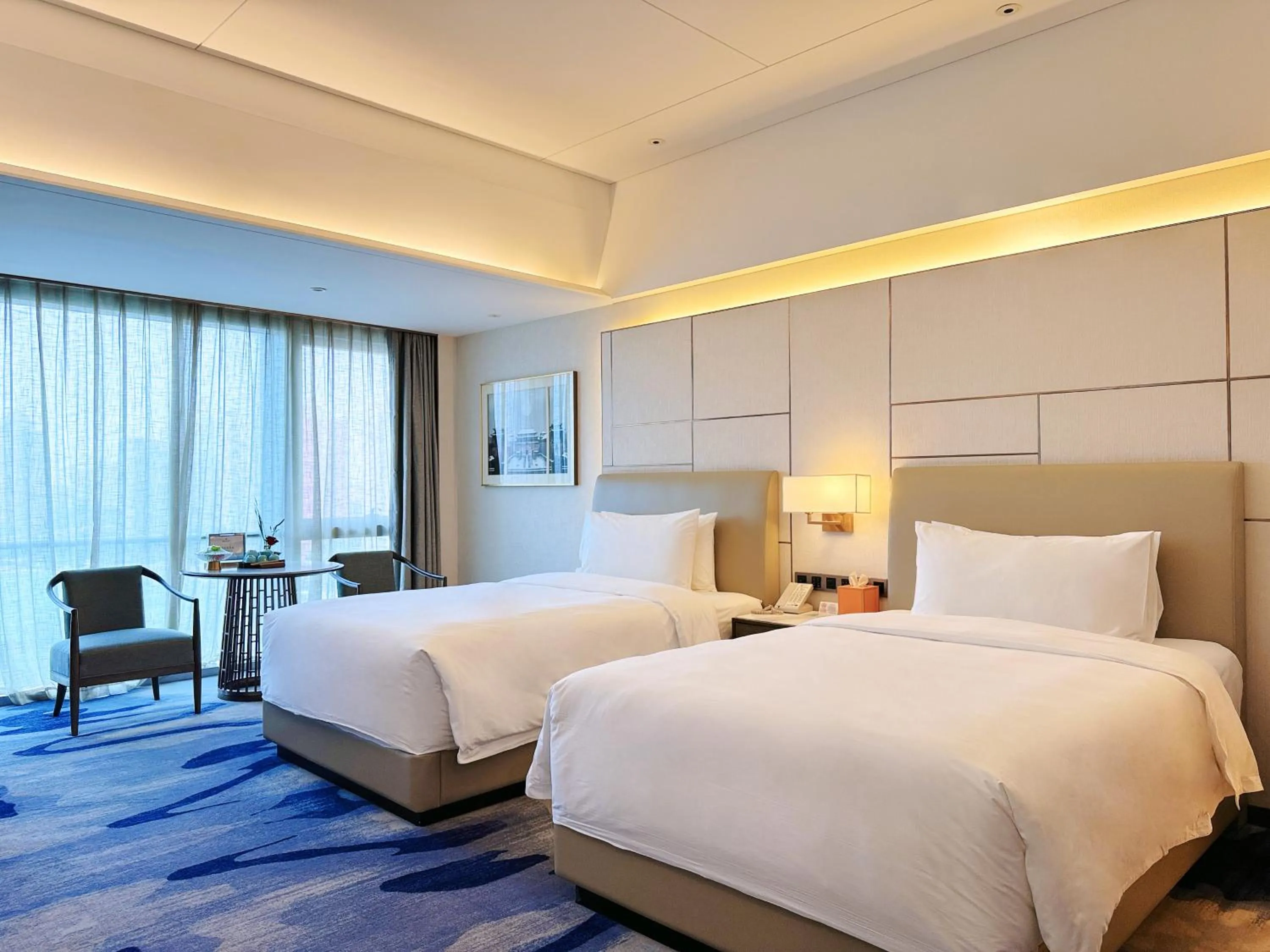 Bed in Beijing Xiamenair Jianianhua Hotel