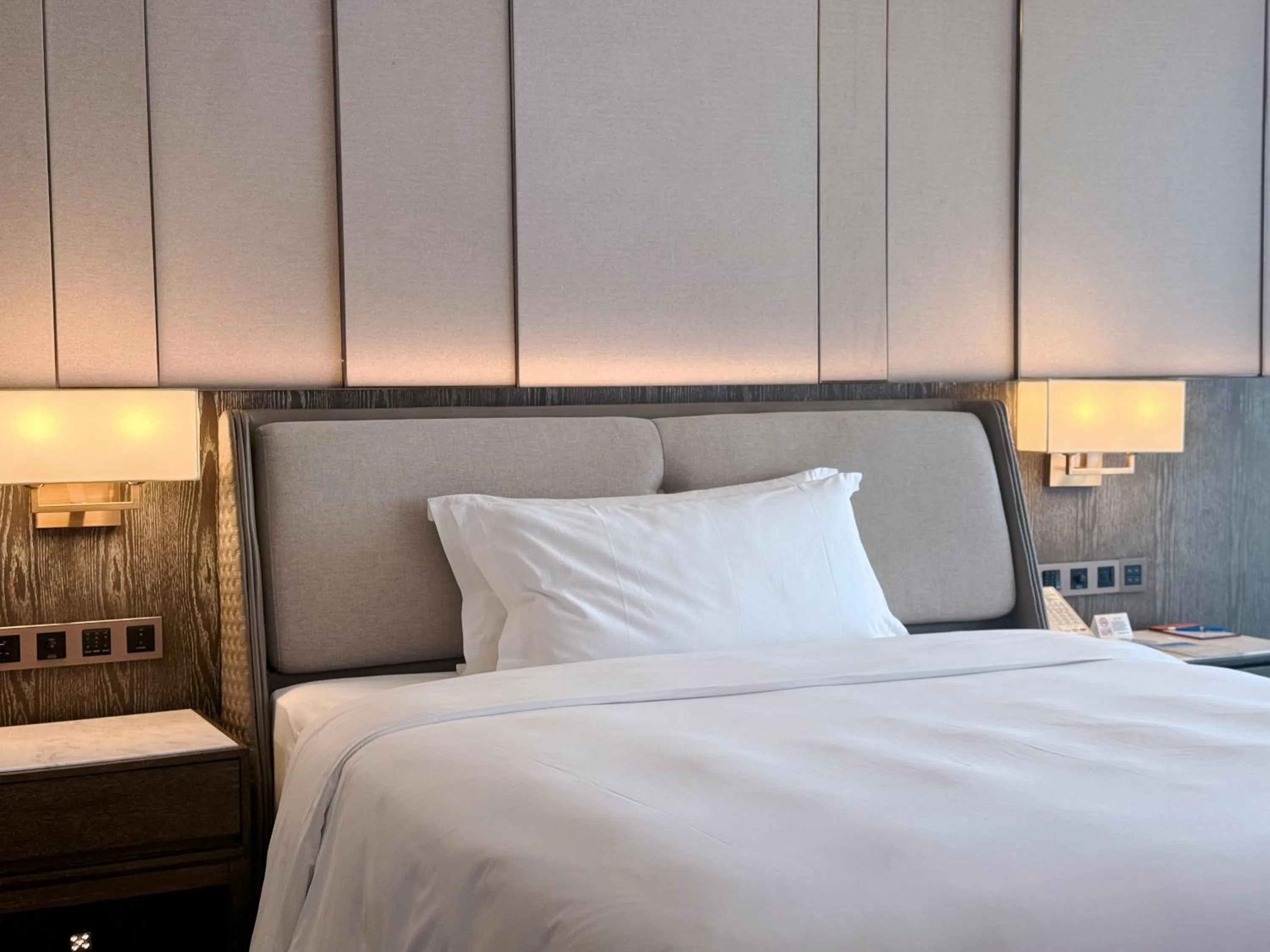 Bed in Beijing Xiamenair Jianianhua Hotel