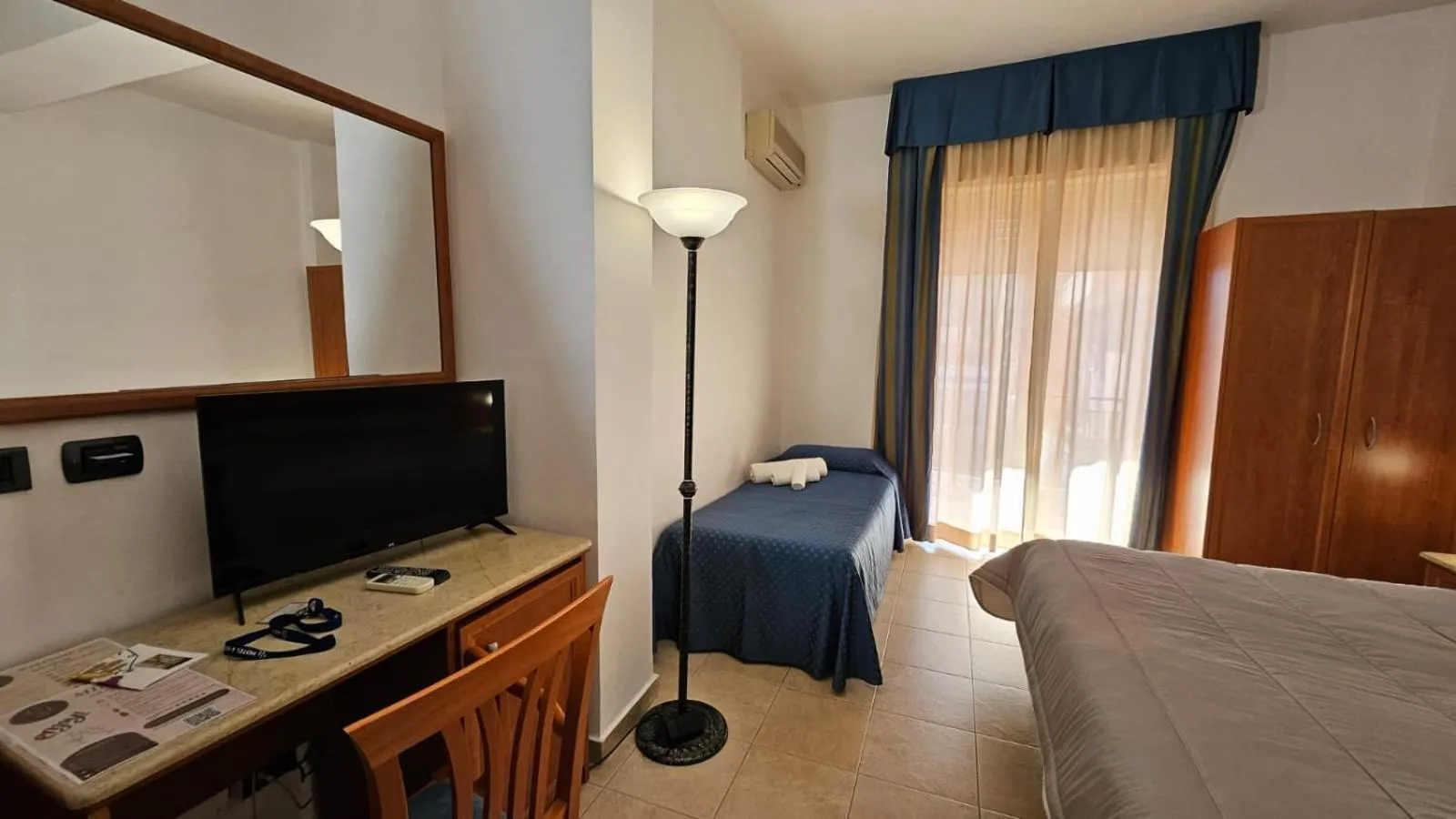 Photo of the whole room, Bed in GH Hotel