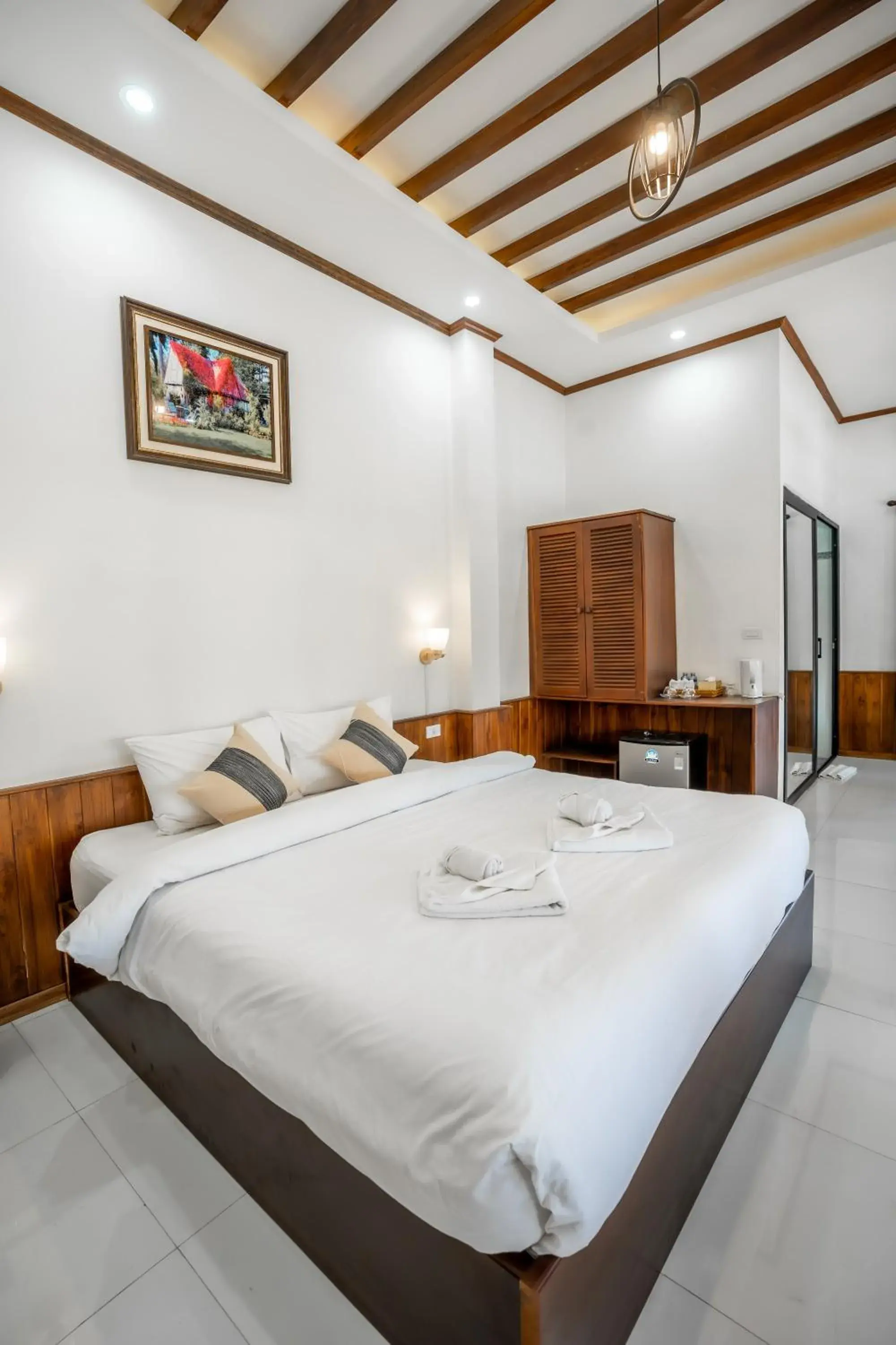 Bed in Luangsay Inn Bed in Luangsay Inn