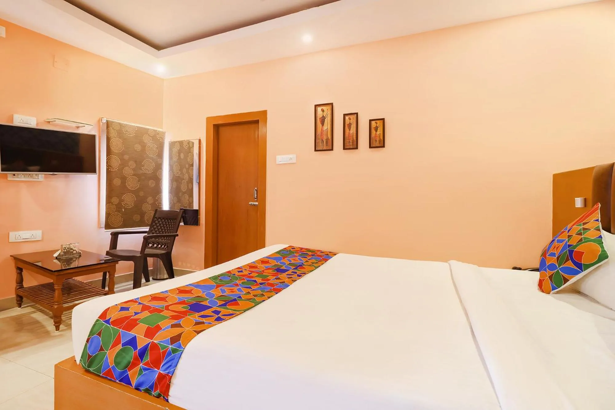Bed in FabHotel Shanti International