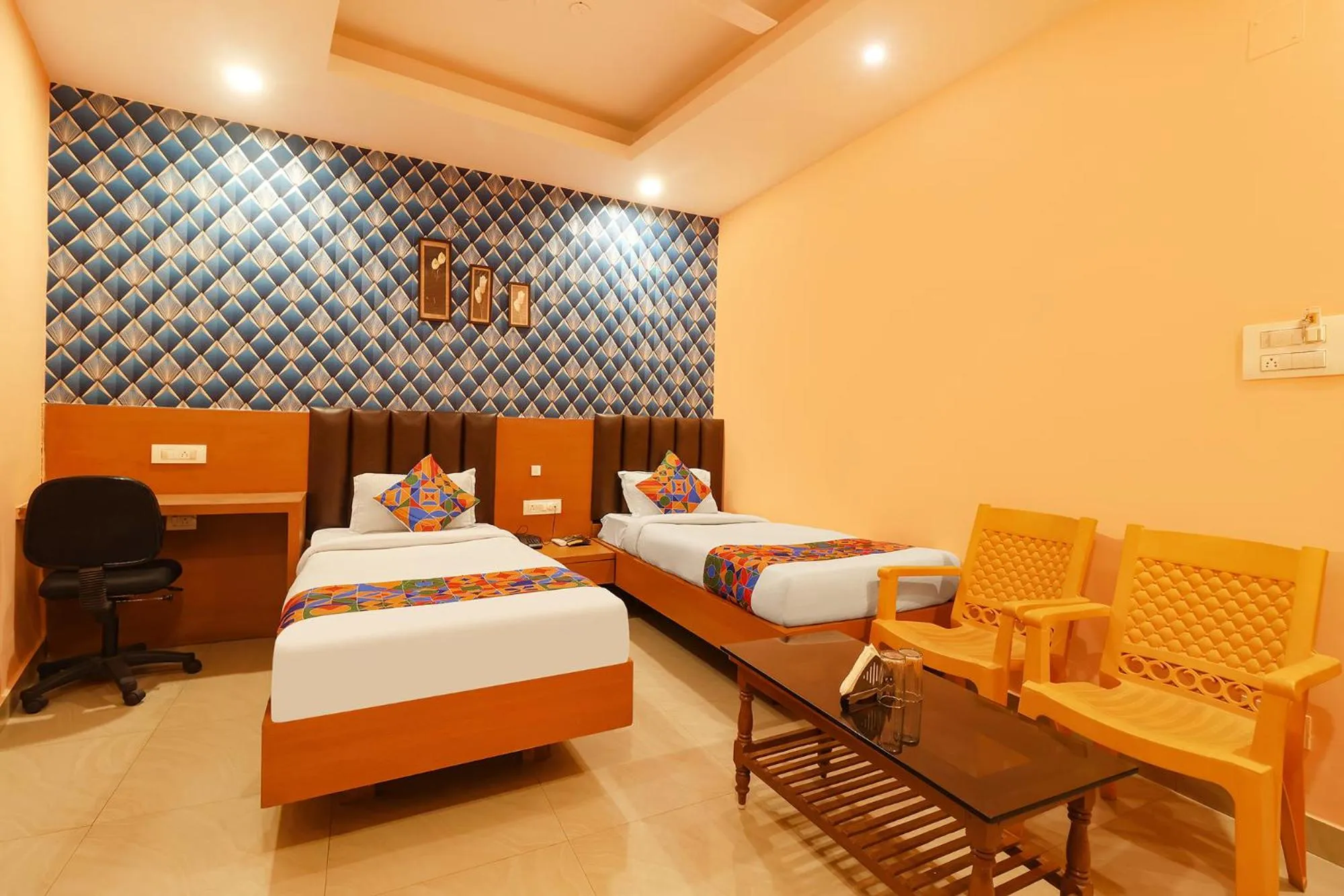 Bed in FabHotel Shanti International