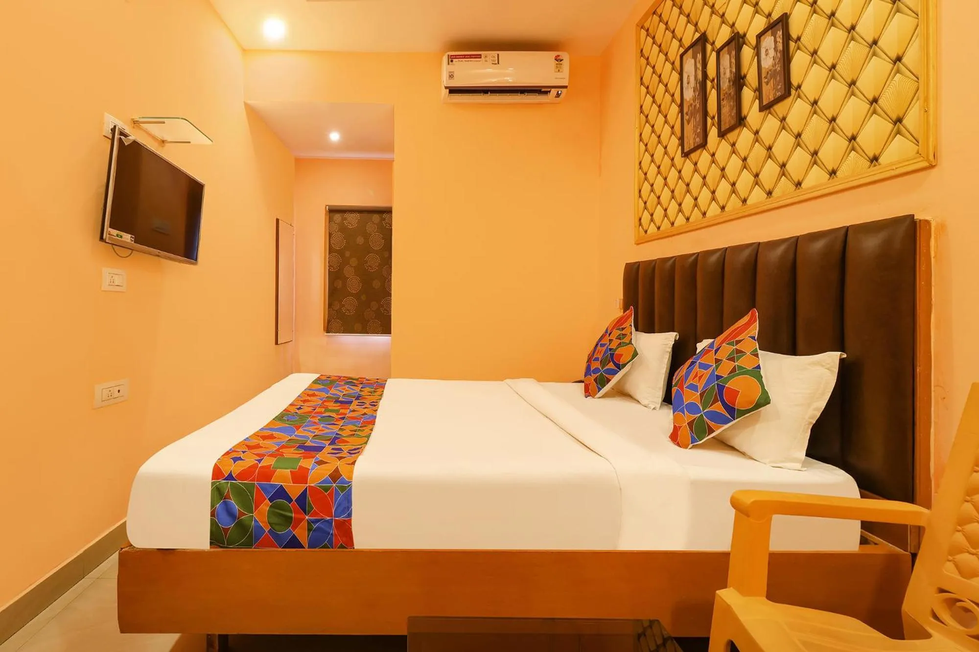 Bed in FabHotel Shanti International