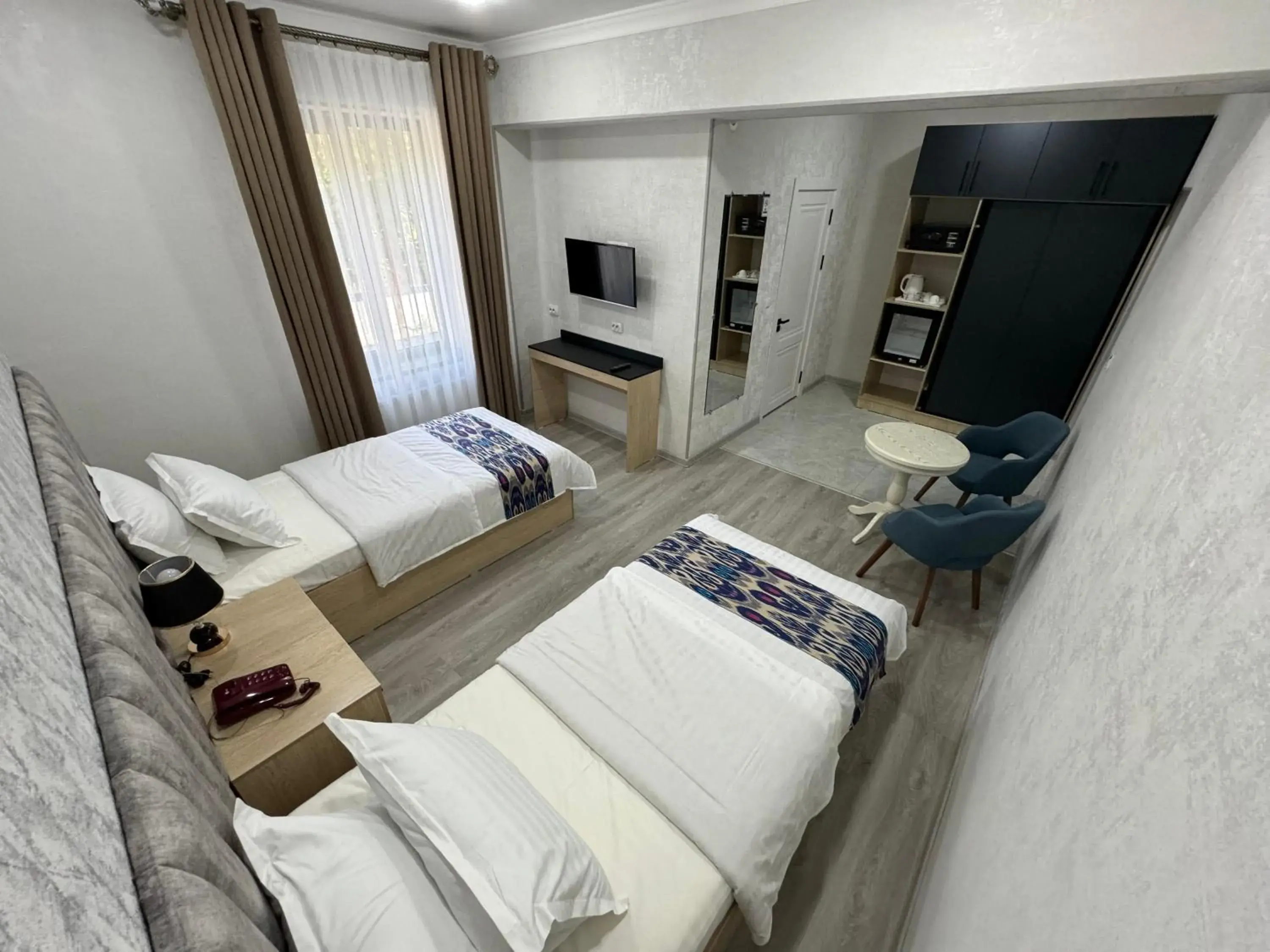 Photo of the whole room, Bed in DSF GARDEN HOTEL Photo of the whole room, Bed in DSF GARDEN HOTEL