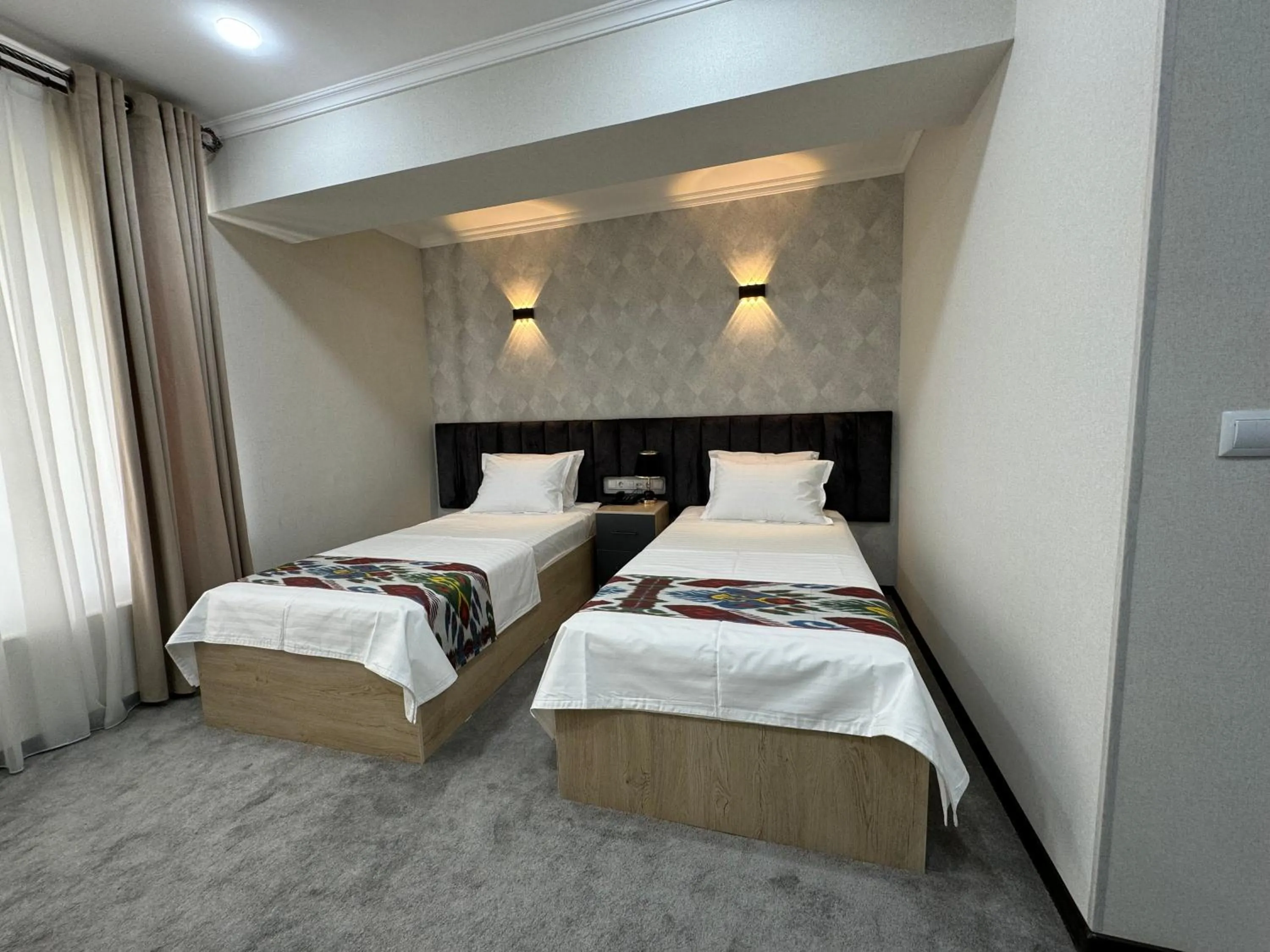 Bed in DSF GARDEN HOTEL