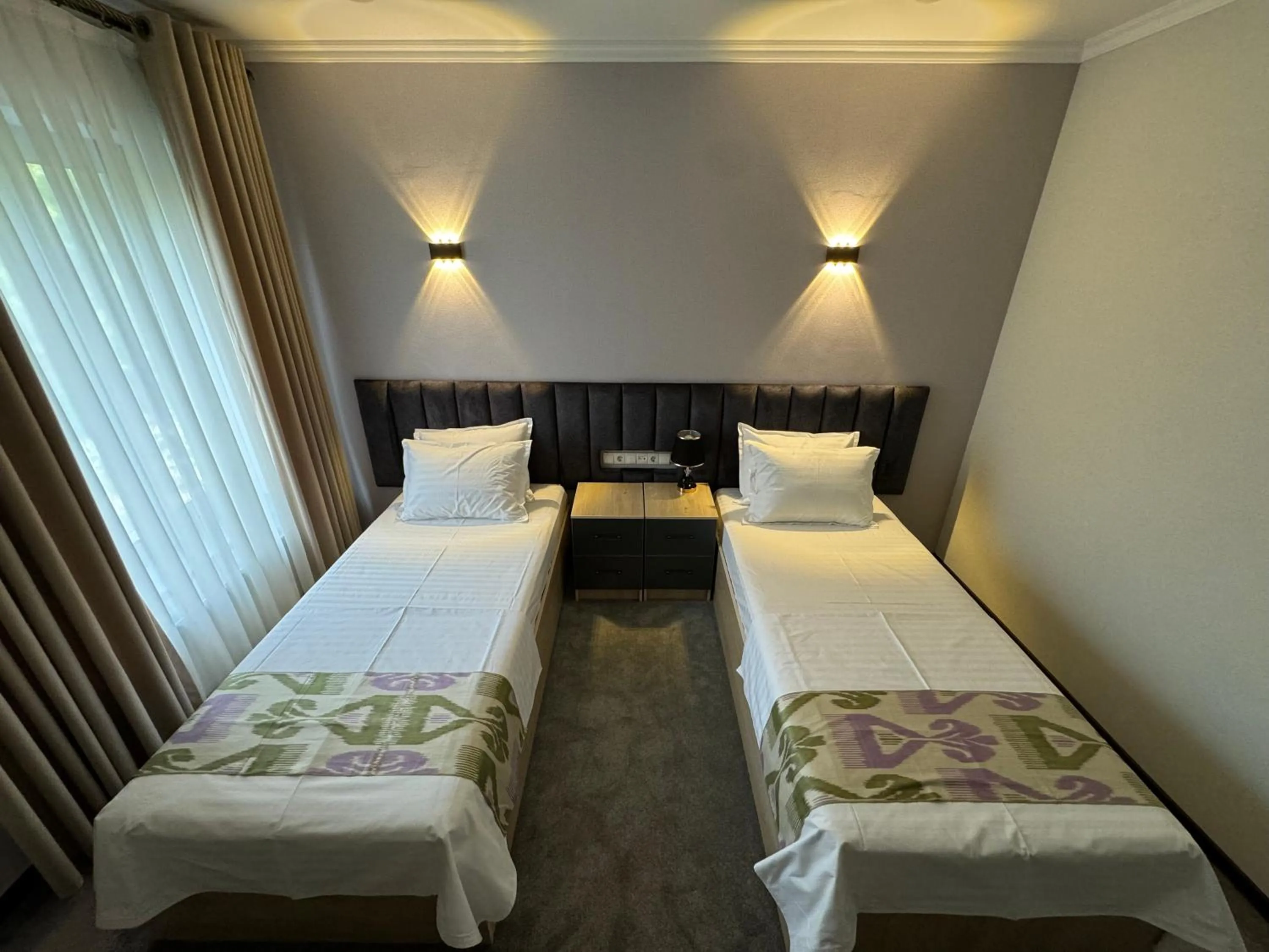 Bed in DSF GARDEN HOTEL