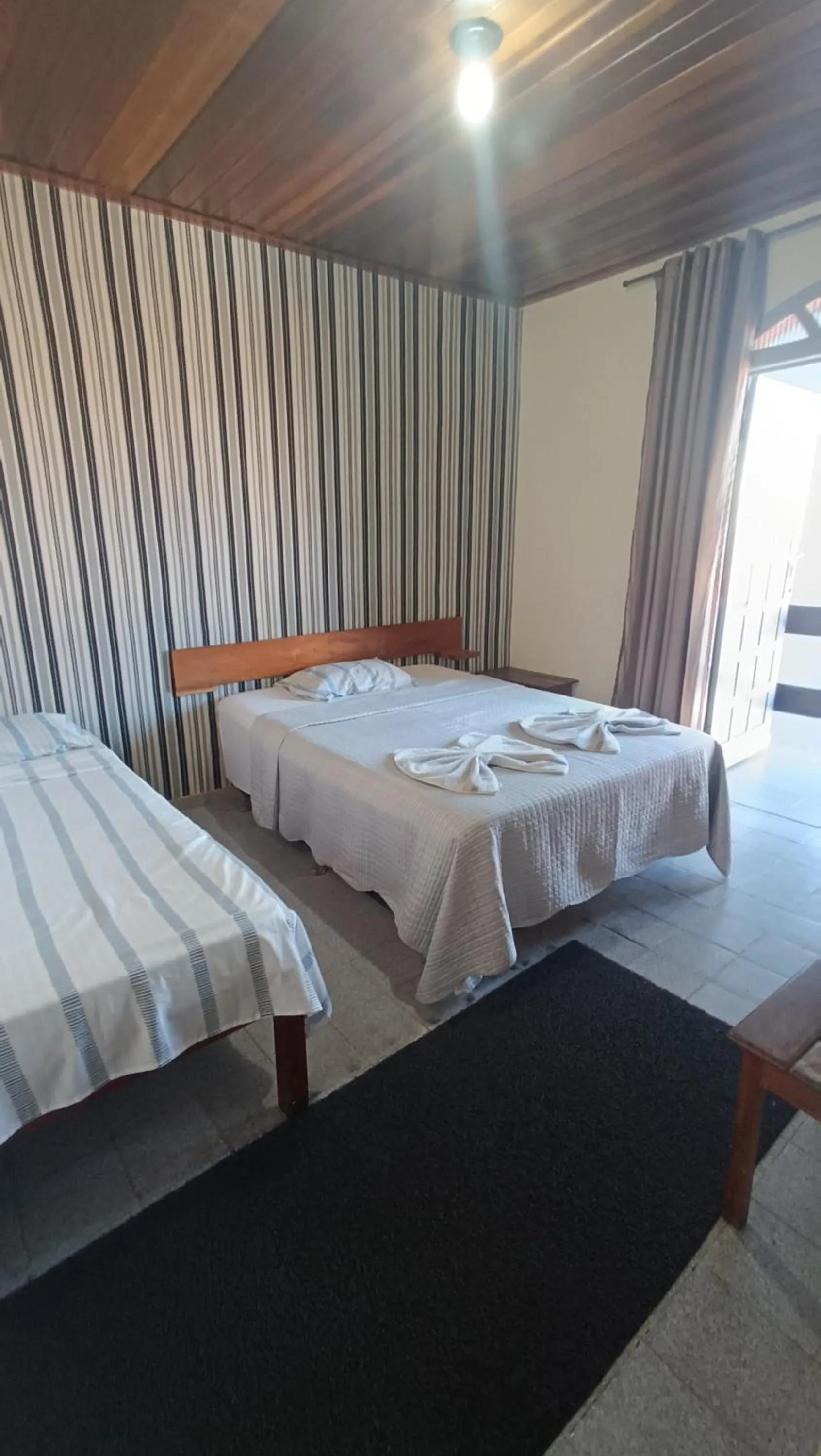 Bed in Pousada da Ale