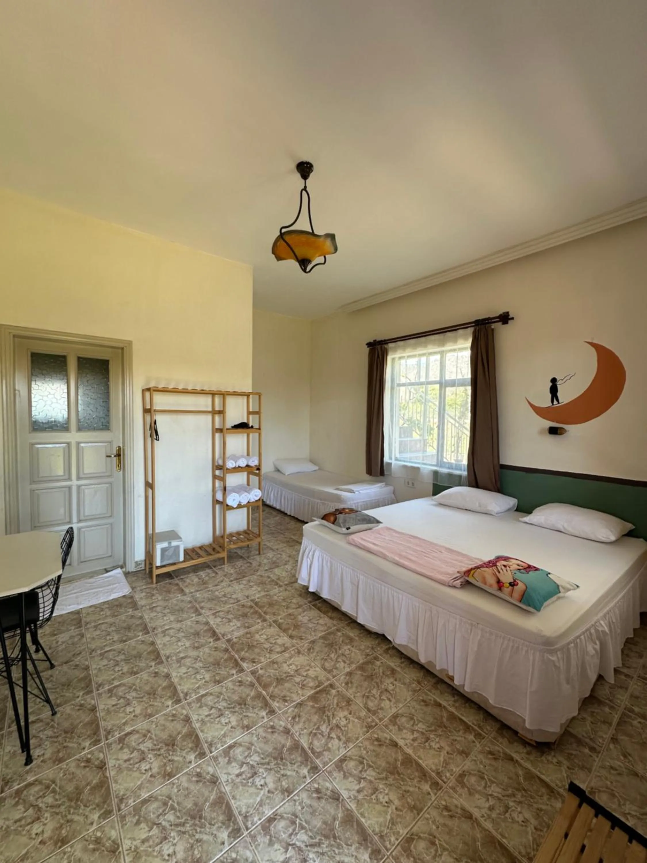 Bed in GAYA PANSİYON ÇIRALI