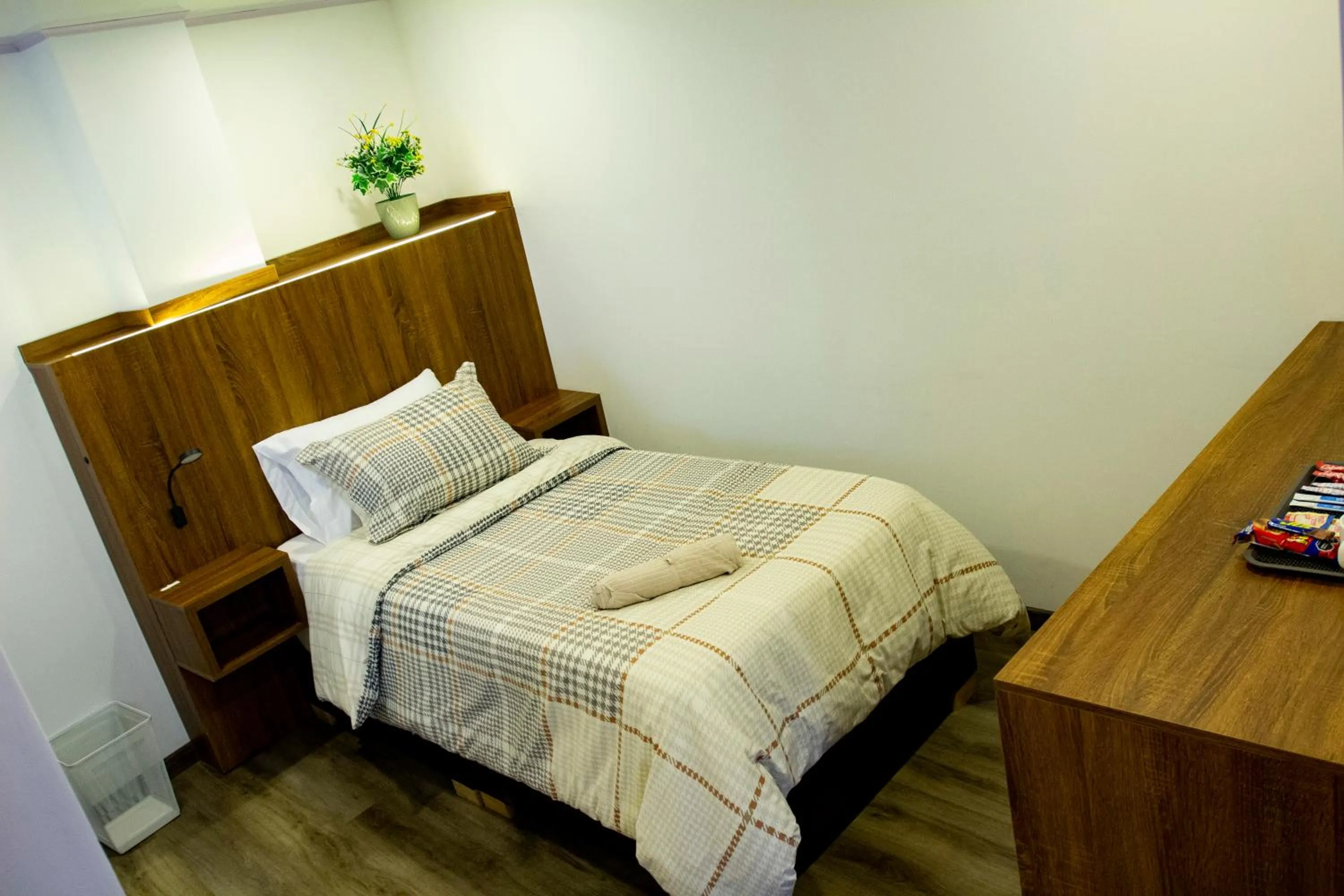 Photo of the whole room, Bed in BOG Living Suites