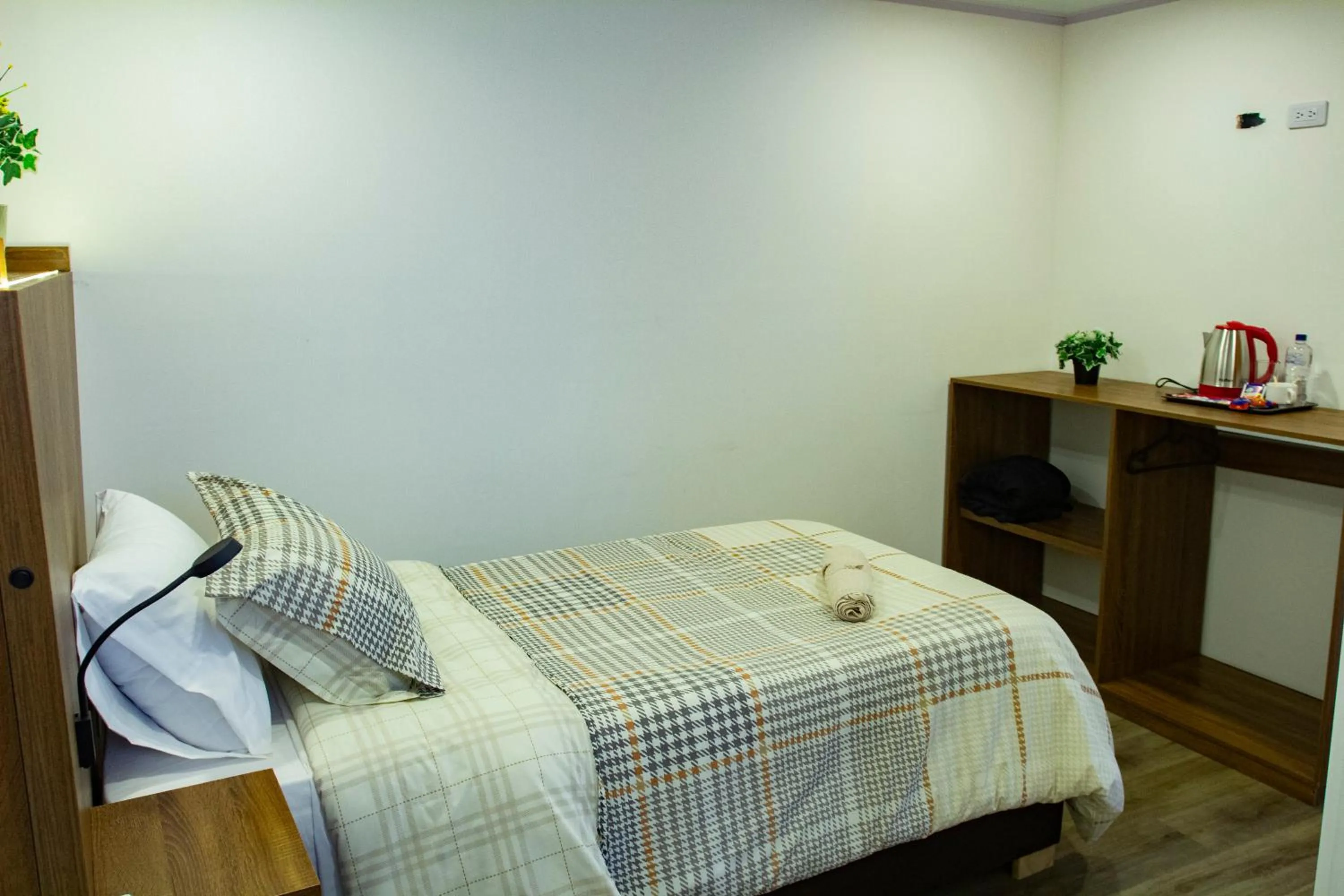 Photo of the whole room, Bed in BOG Living Suites