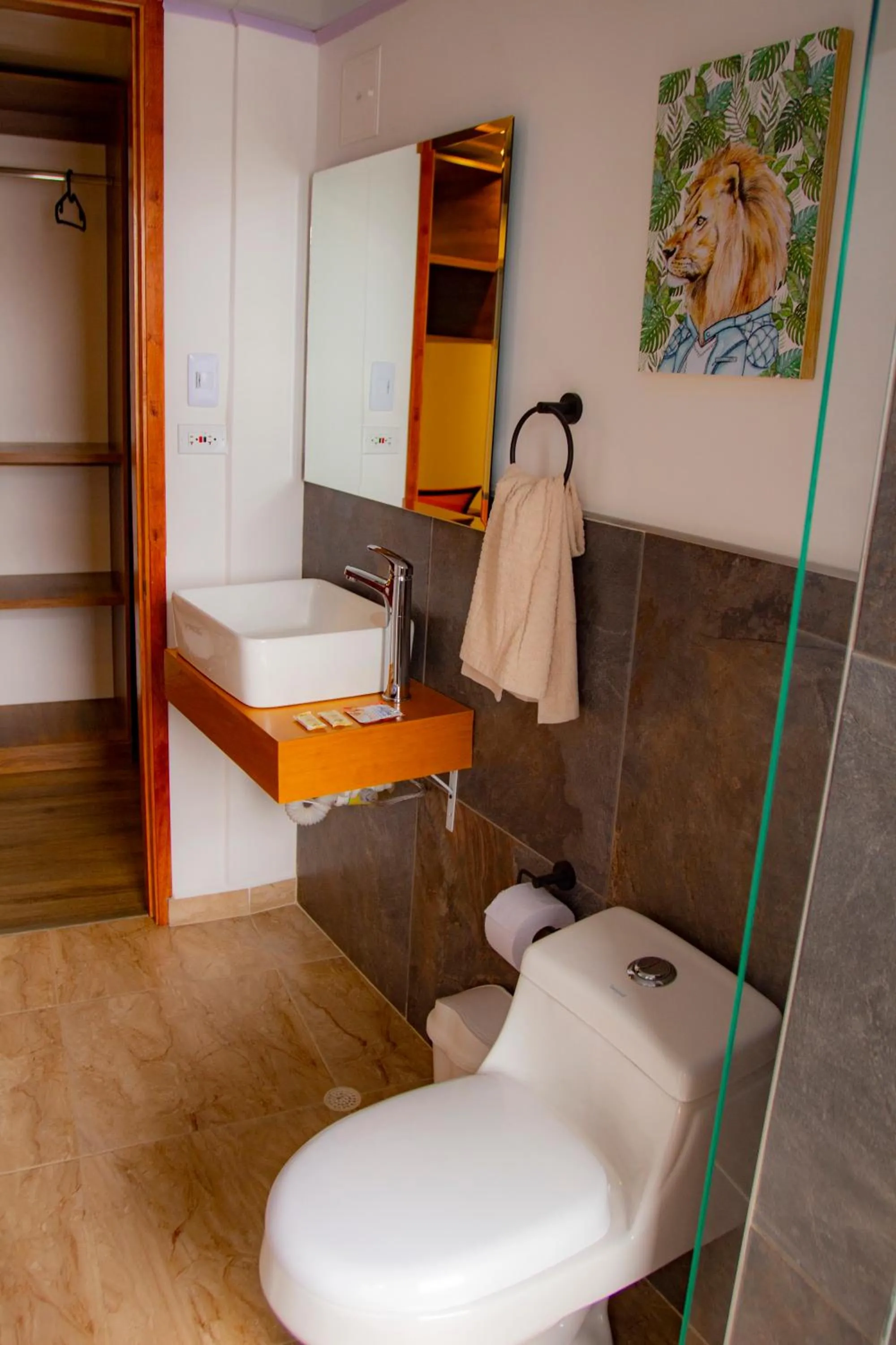 Toilet in BOG Living Suites