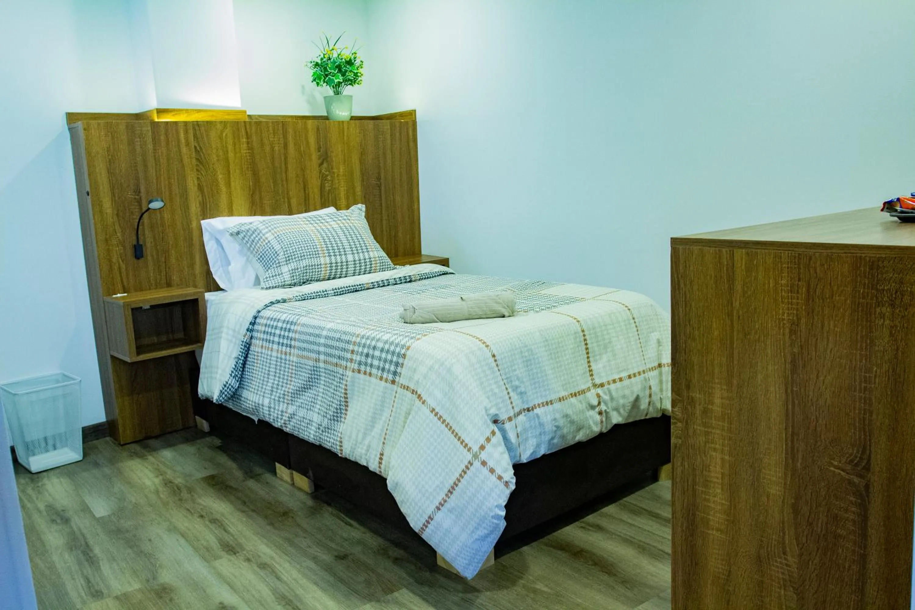 Bed in BOG Living Suites