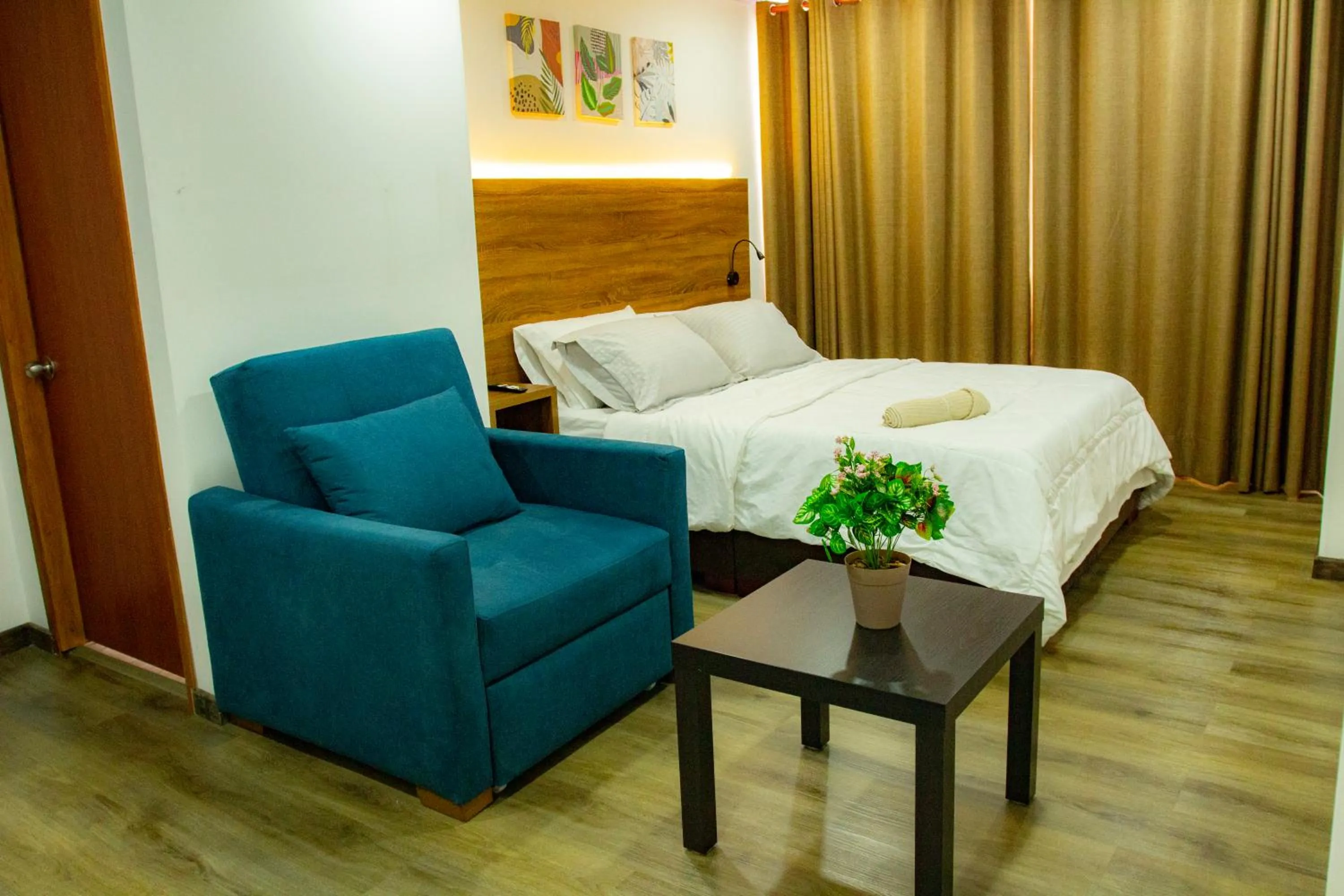 Photo of the whole room, Bed in BOG Living Suites
