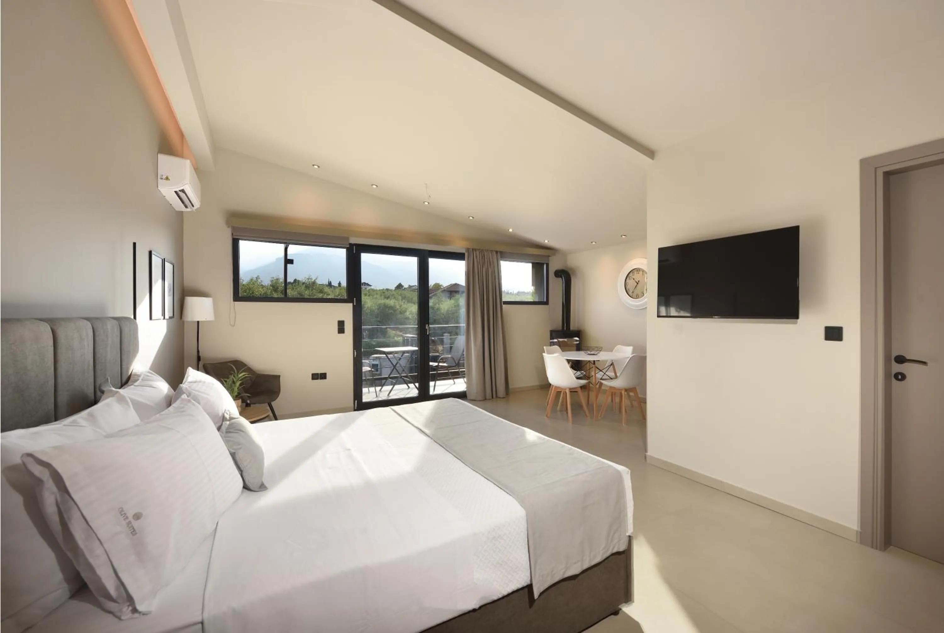 Photo of the whole room, Bed in Olive All-Seasons Suites, Panel Hospitality Homes & Villas