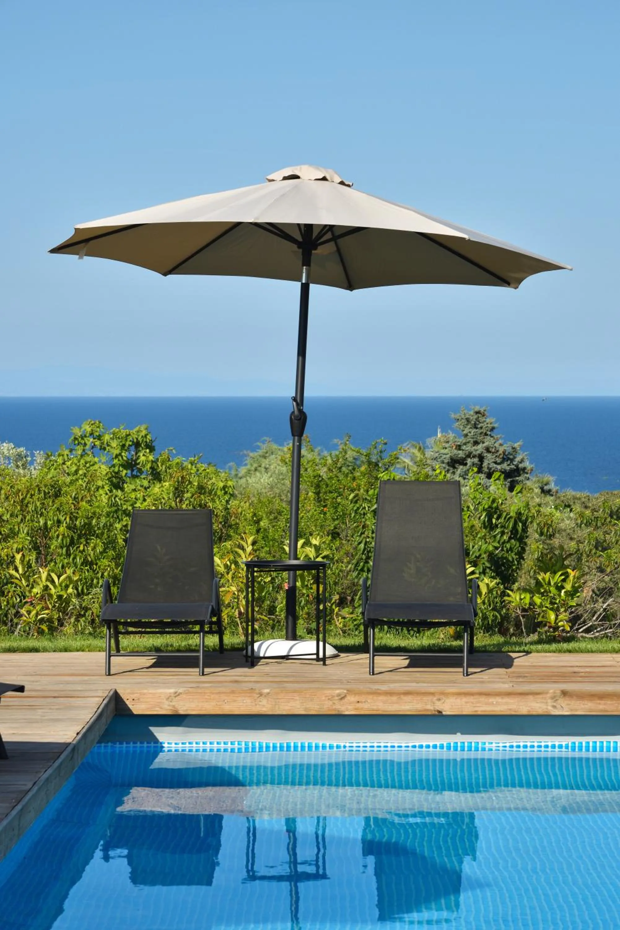 Swimming pool in Olive All-Seasons Suites, Panel Hospitality Homes & Villas