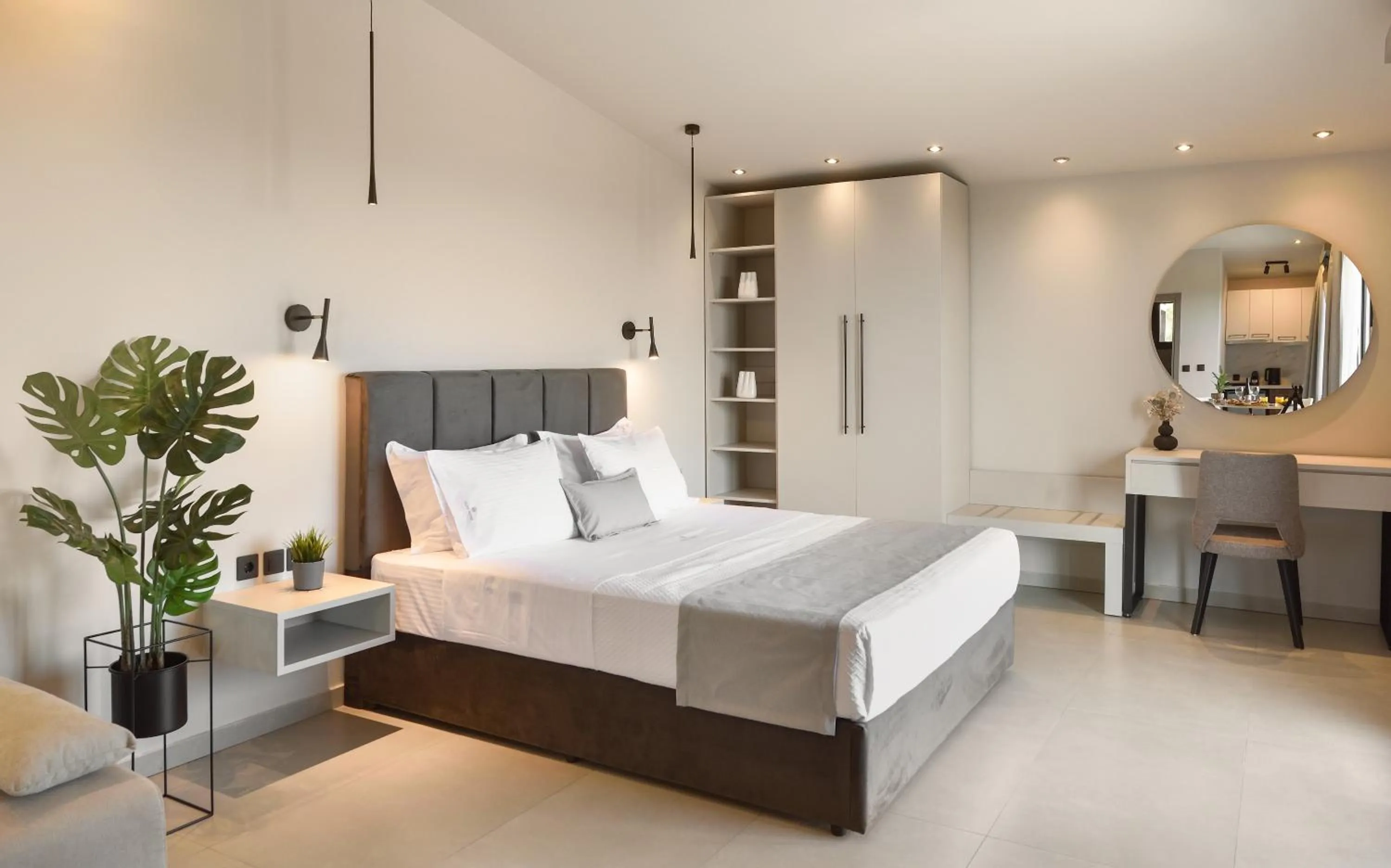 Bed in Olive All-Seasons Suites, Panel Hospitality Homes & Villas