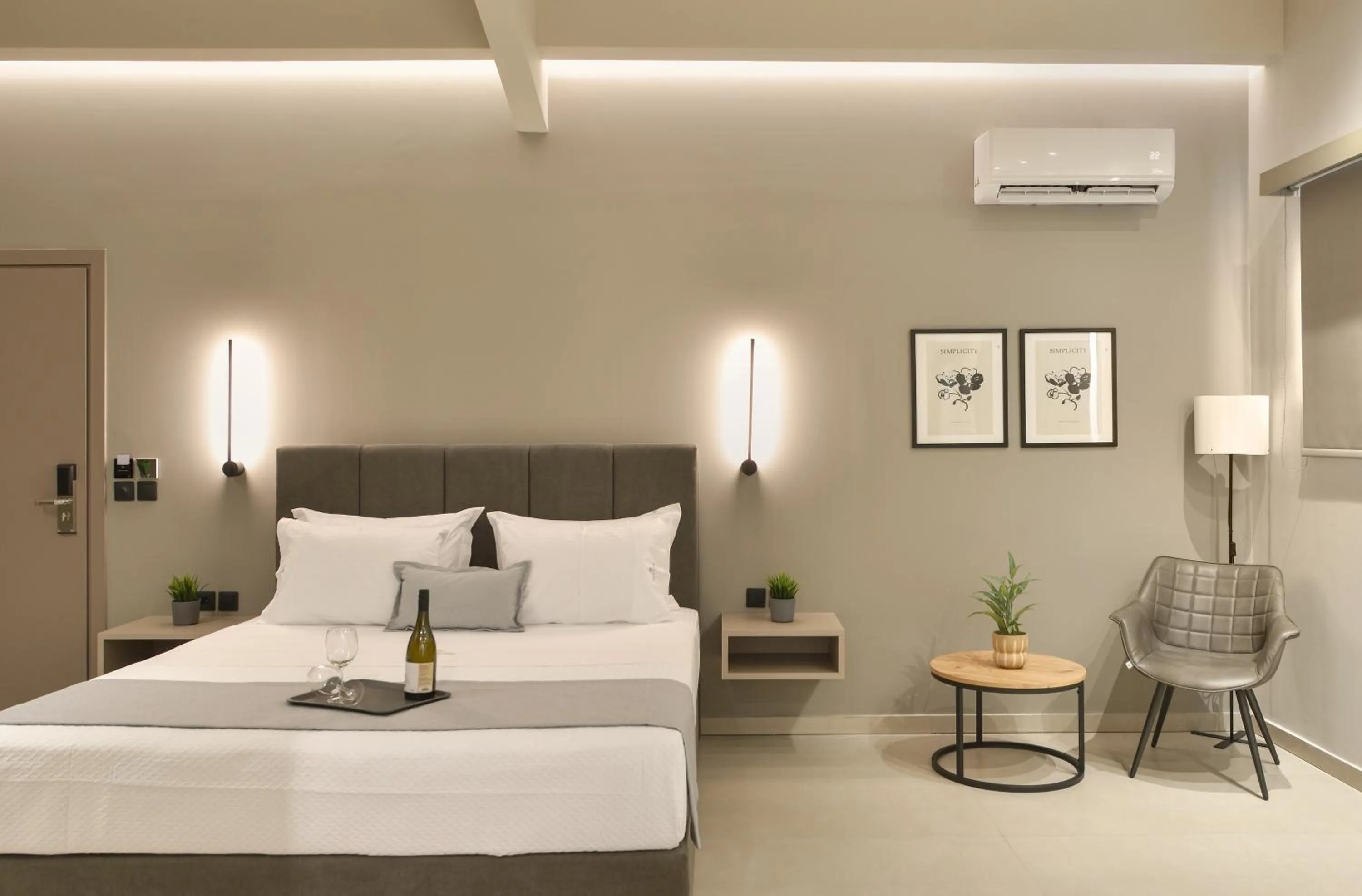 Bed in Olive All-Seasons Suites, Panel Hospitality Homes & Villas