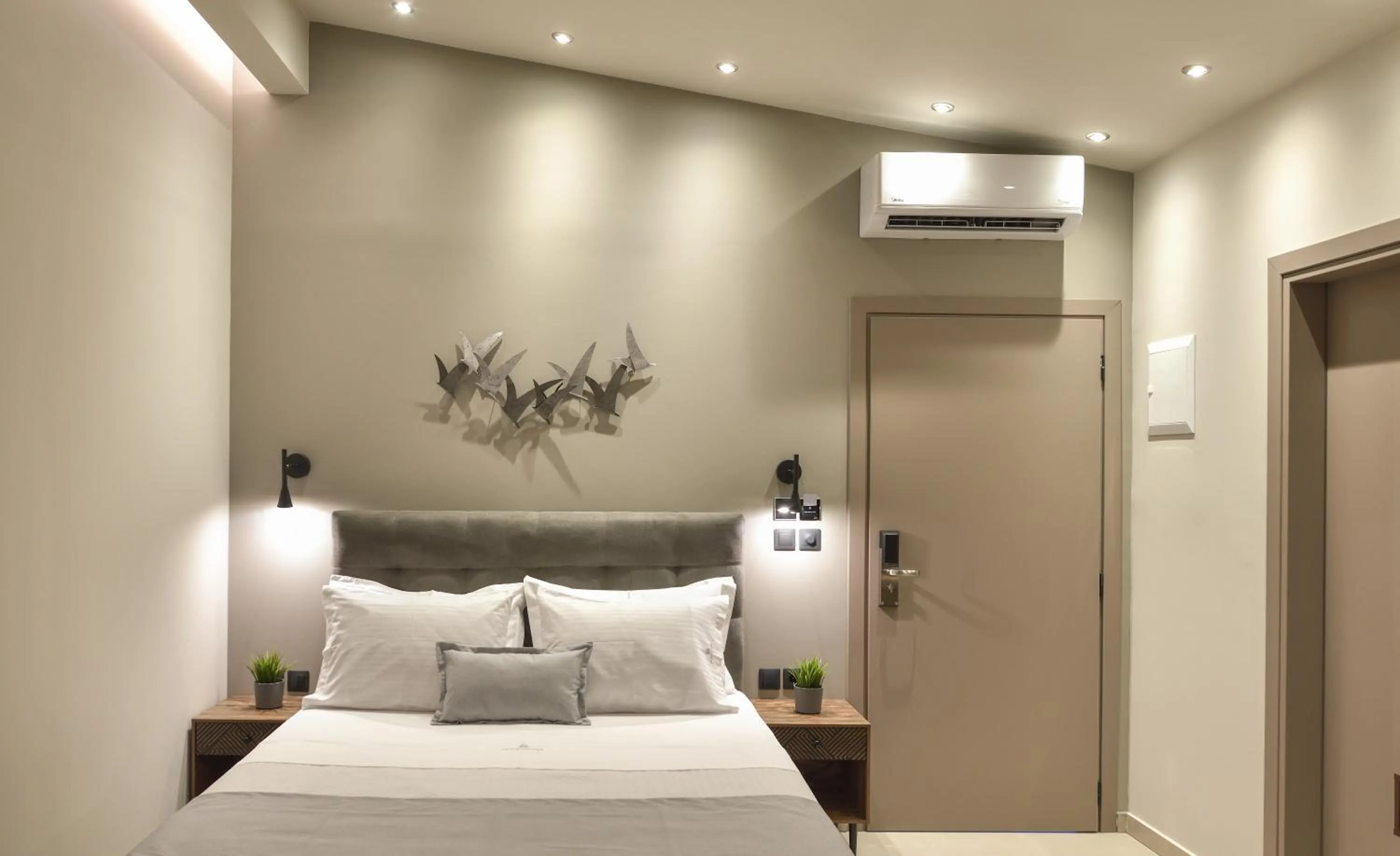 Bed in Olive All-Seasons Suites, Panel Hospitality Homes & Villas