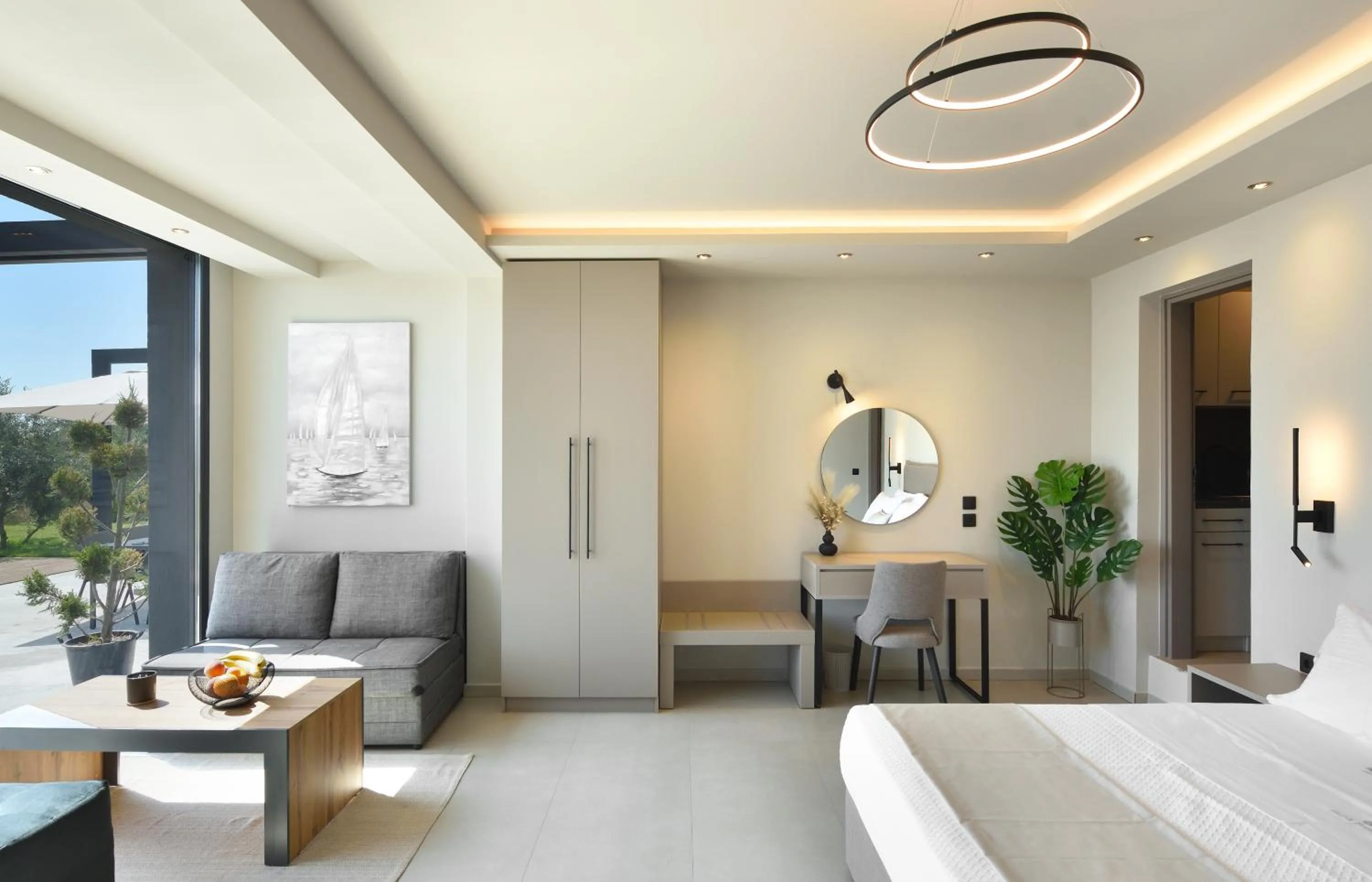 Seating area, Bed in Olive All-Seasons Suites, Panel Hospitality Homes & Villas